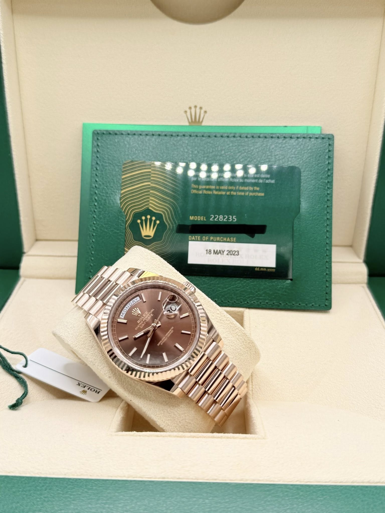 May be an image of wrist watch and text
