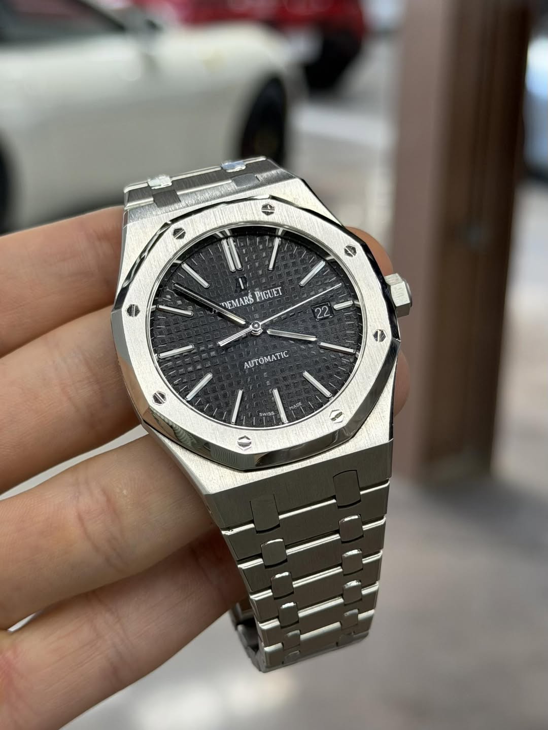 May be an image of wrist watch and text