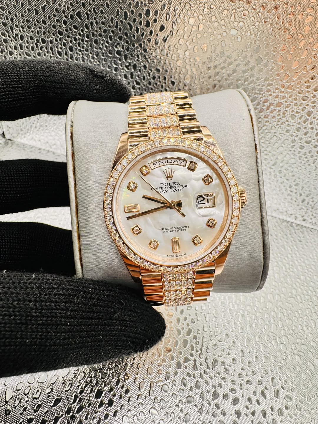 May be an image of wrist watch and text