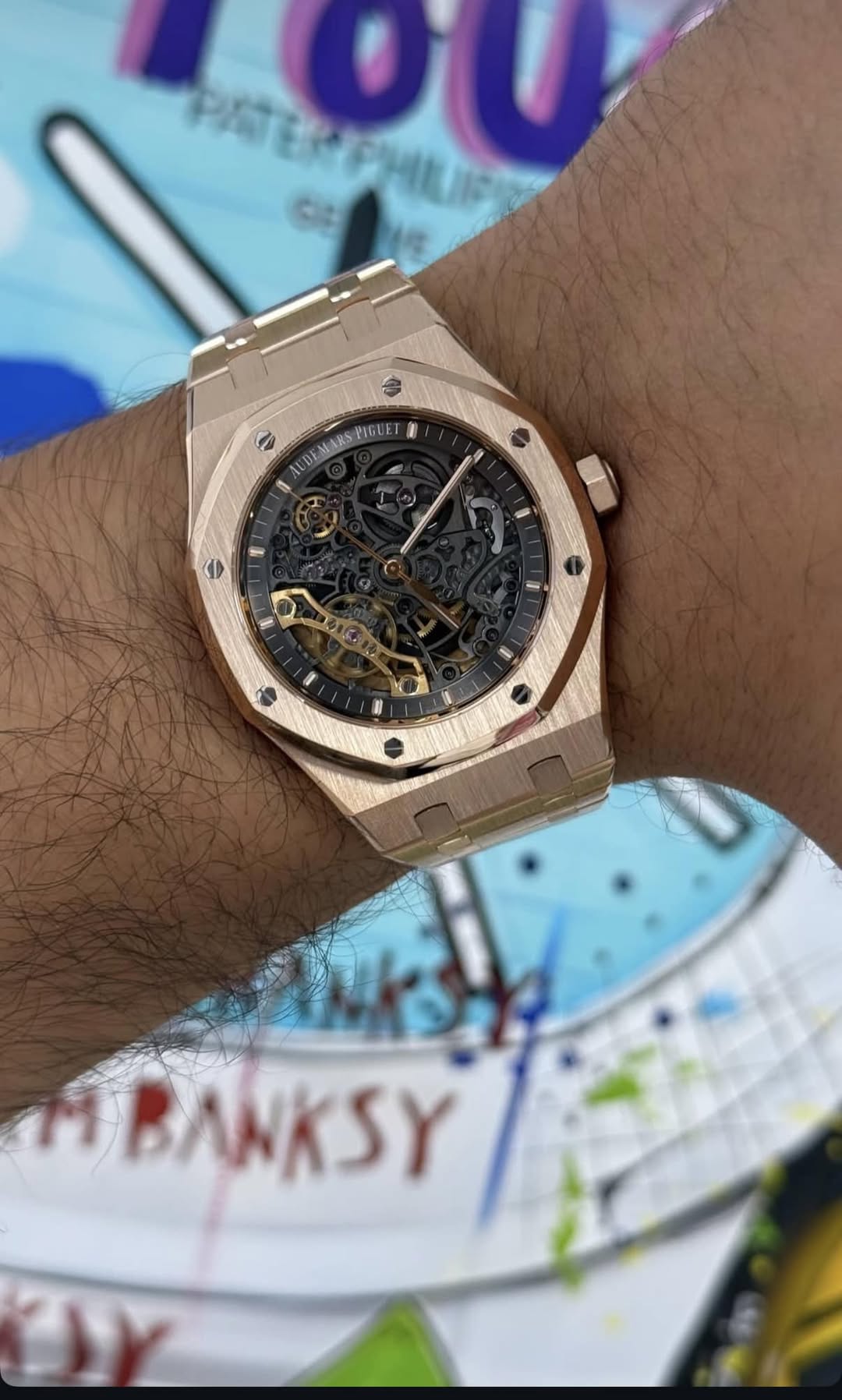 May be an image of wrist watch and text
