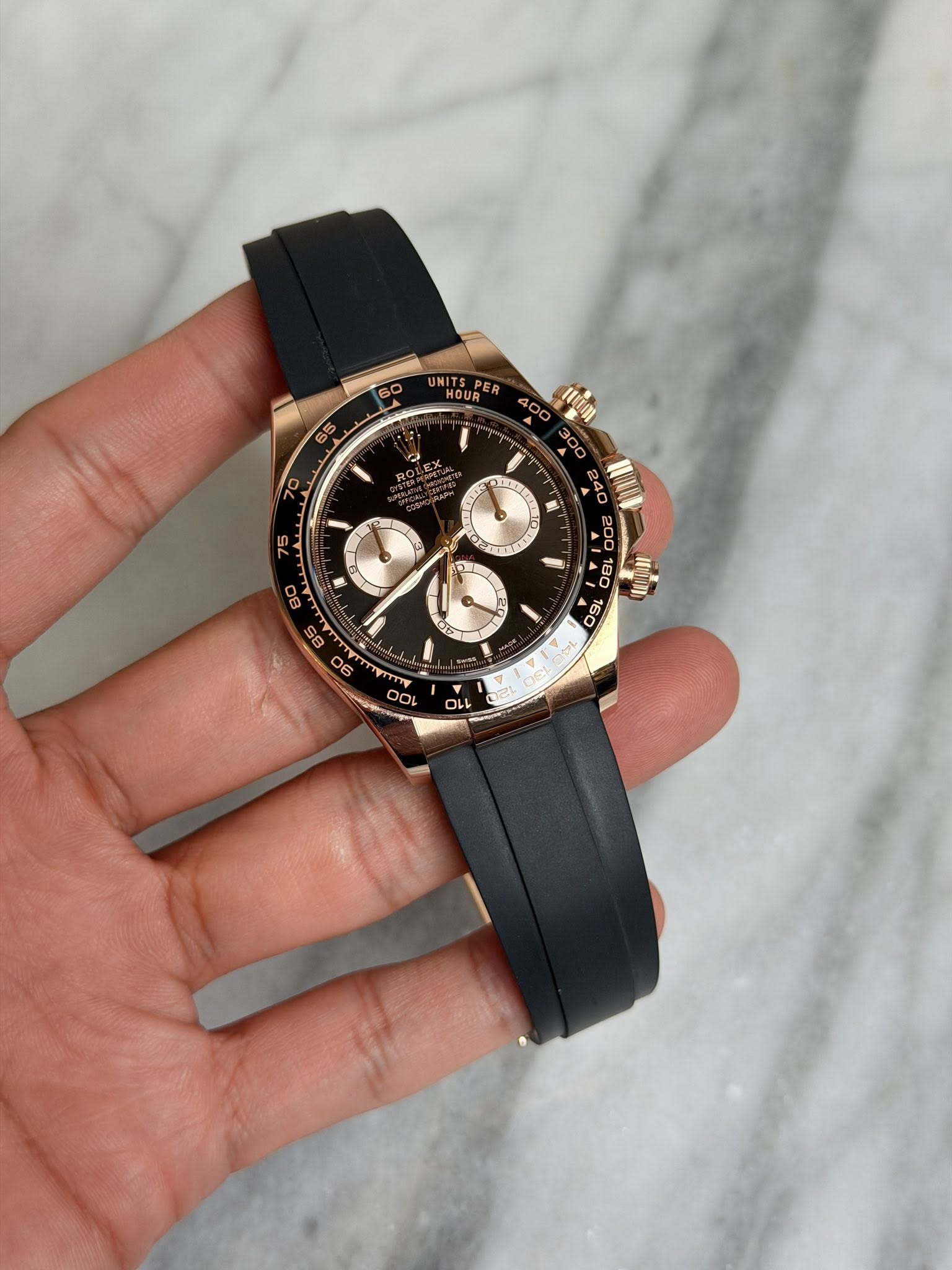 May be an image of wrist watch and text