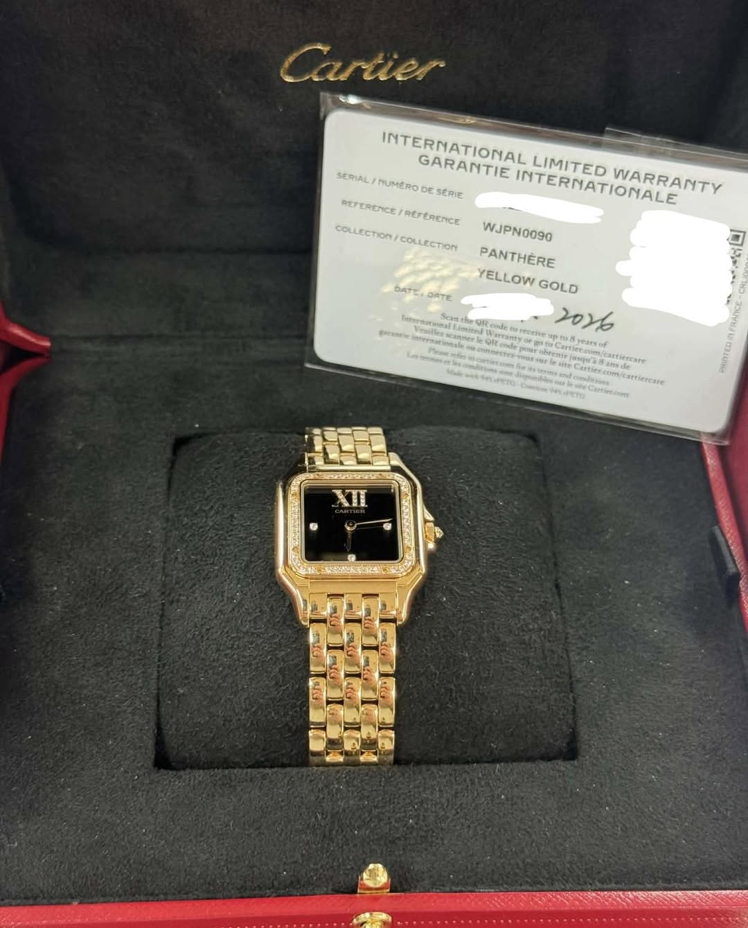 May be an image of wrist watch and text