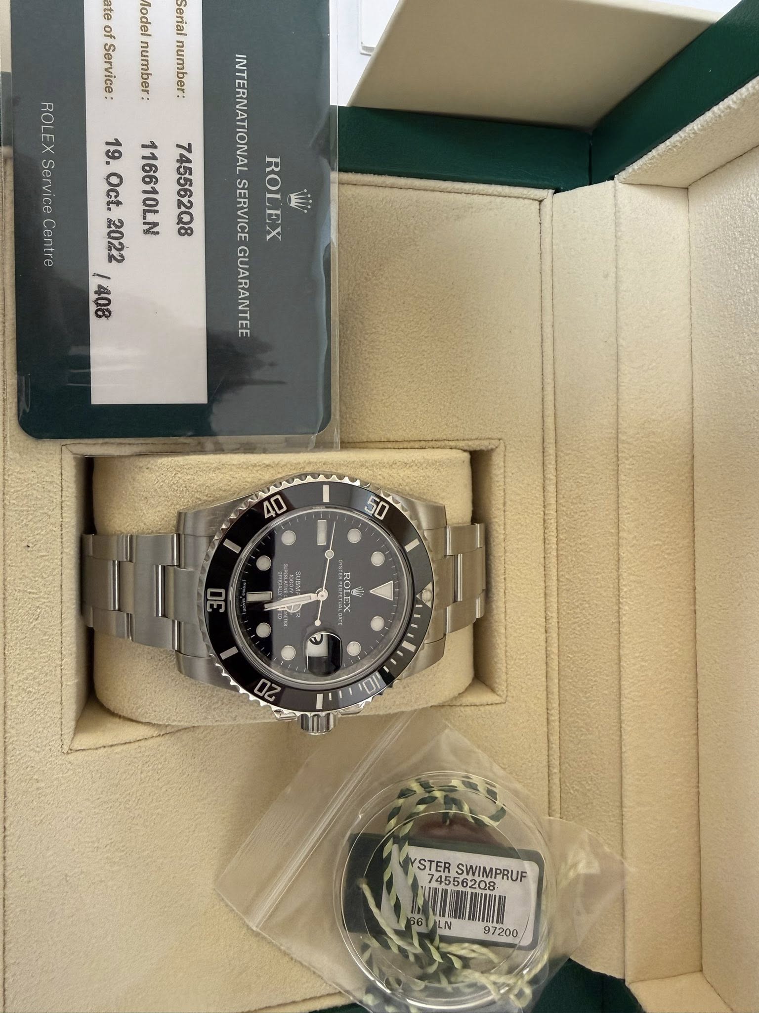 May be an image of wrist watch and text that says 'e ate of Model Serial Service: number: number: ROLEXServiceCentre Centre ROLEX INTERNATIONAL Service Oct. 19. 116610LN…