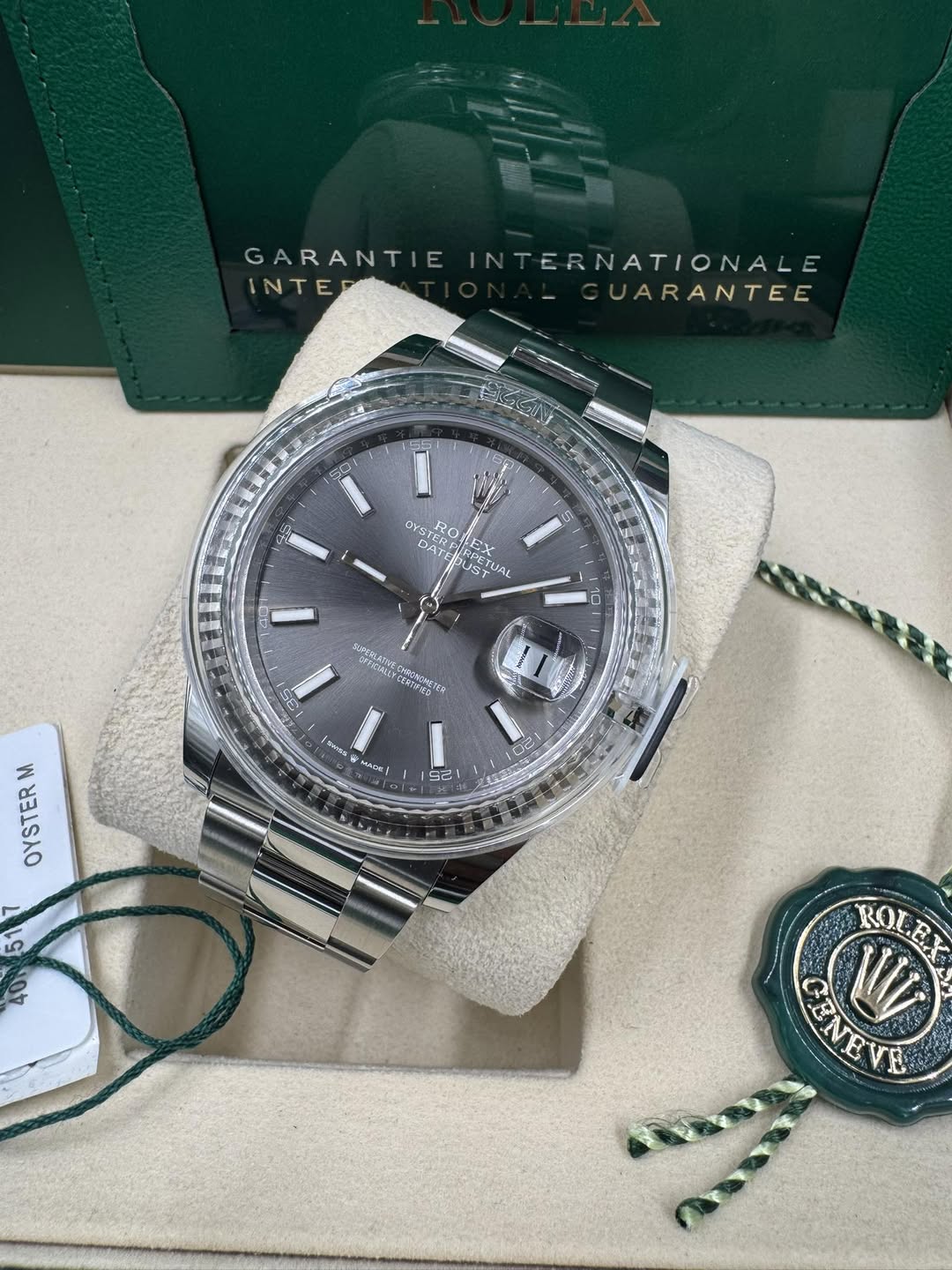 May be an image of wrist watch and text