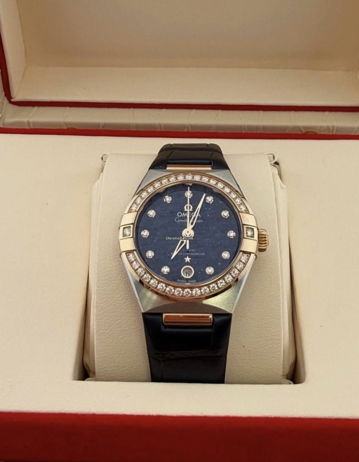 May be an image of wrist watch and text