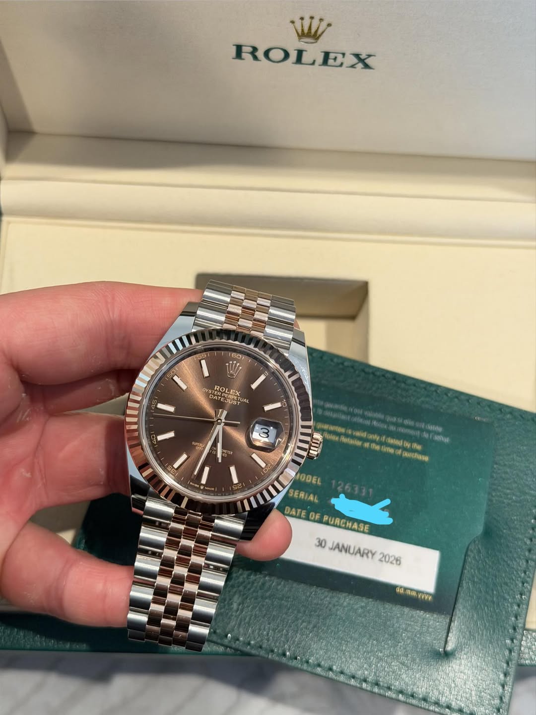 May be an image of wrist watch and text