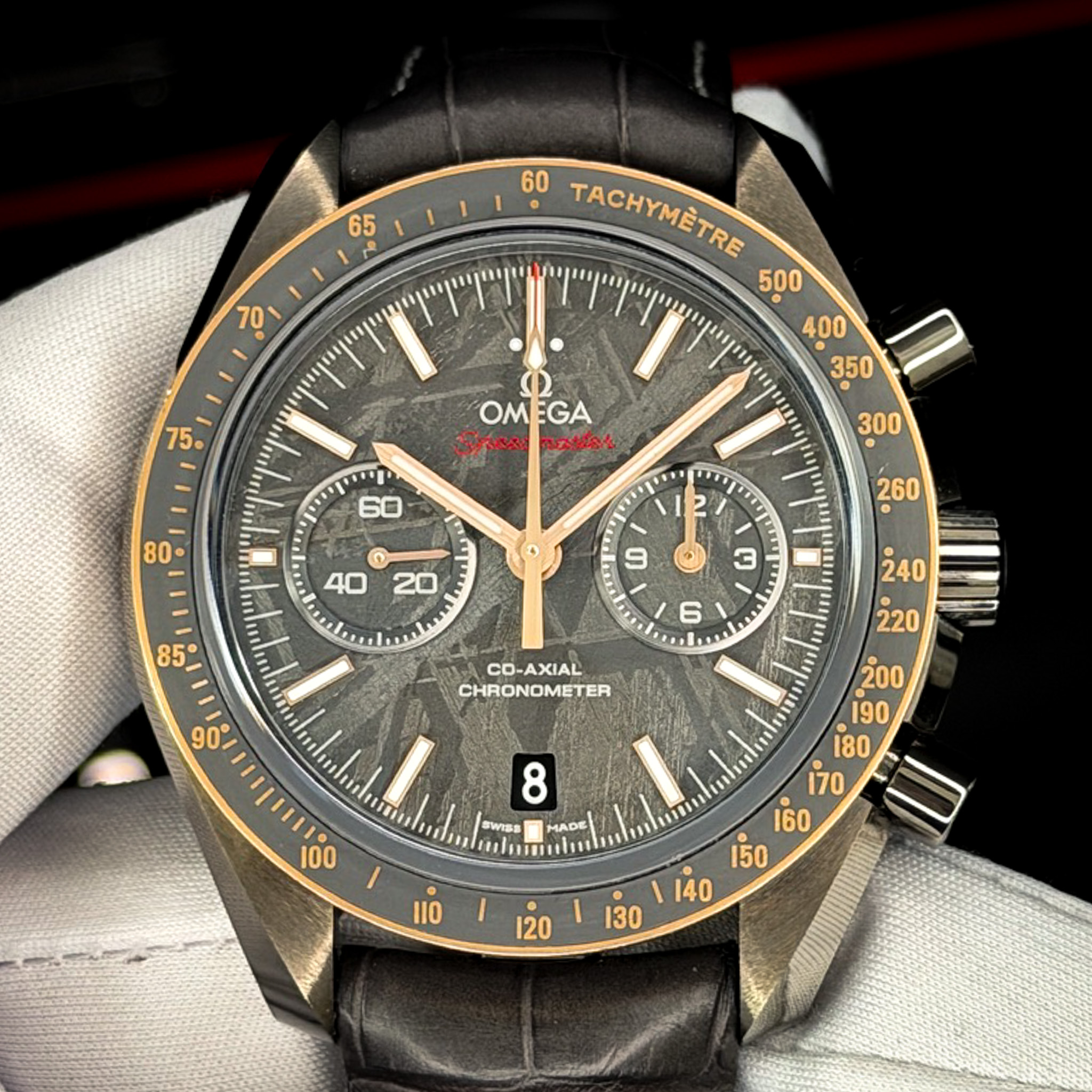 May be an image of wrist watch and text that says '65 10 60 TACHYMÈTRE OMEGA OM EGA あけんさ 김고식소 2533 ! I1 mi ก 40 20 ml ١ 9 260 ව 3 6 240 CO-AXIAL CHRONOMETER 90. 8 SWISS MADE 등 130…