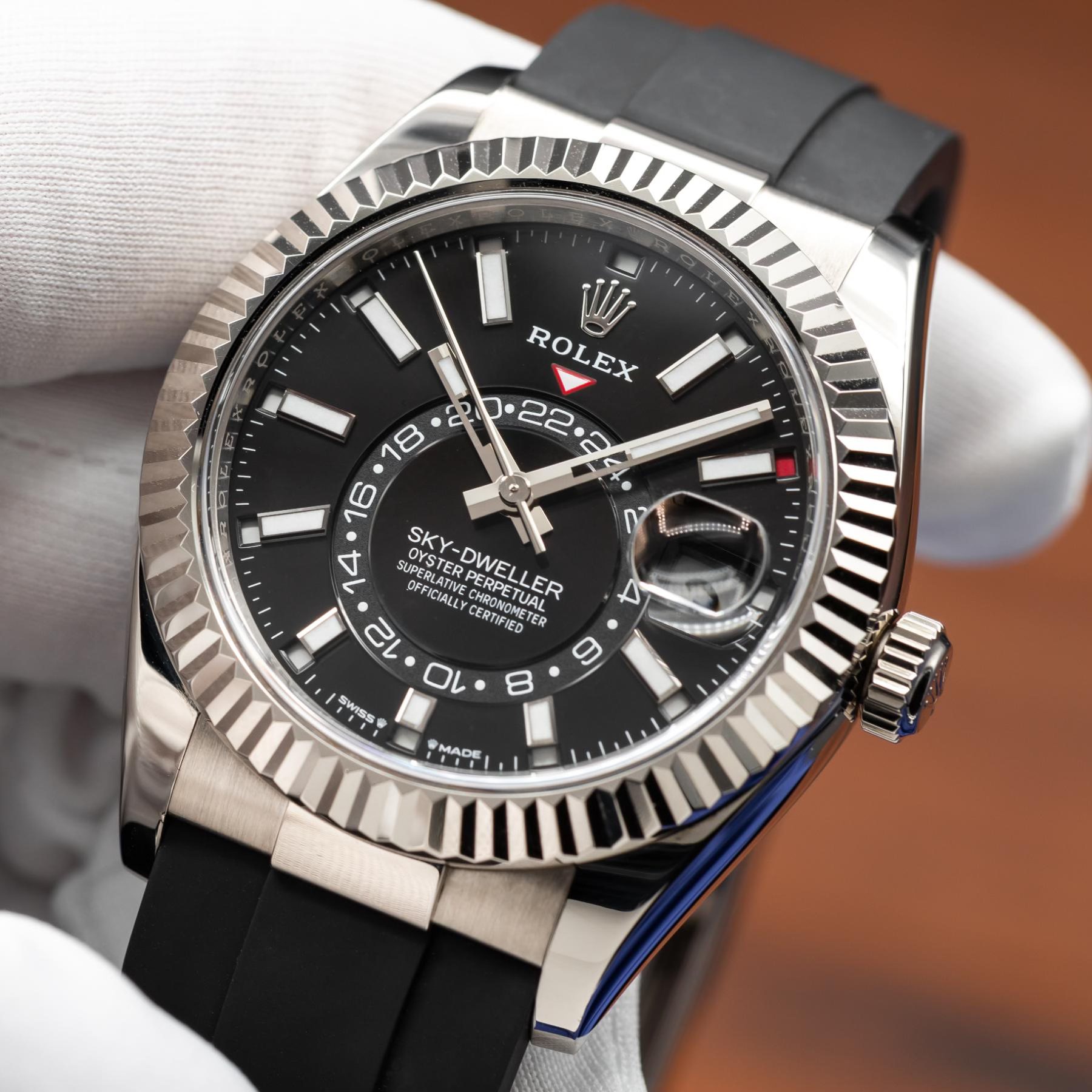 May be an image of wrist watch and text