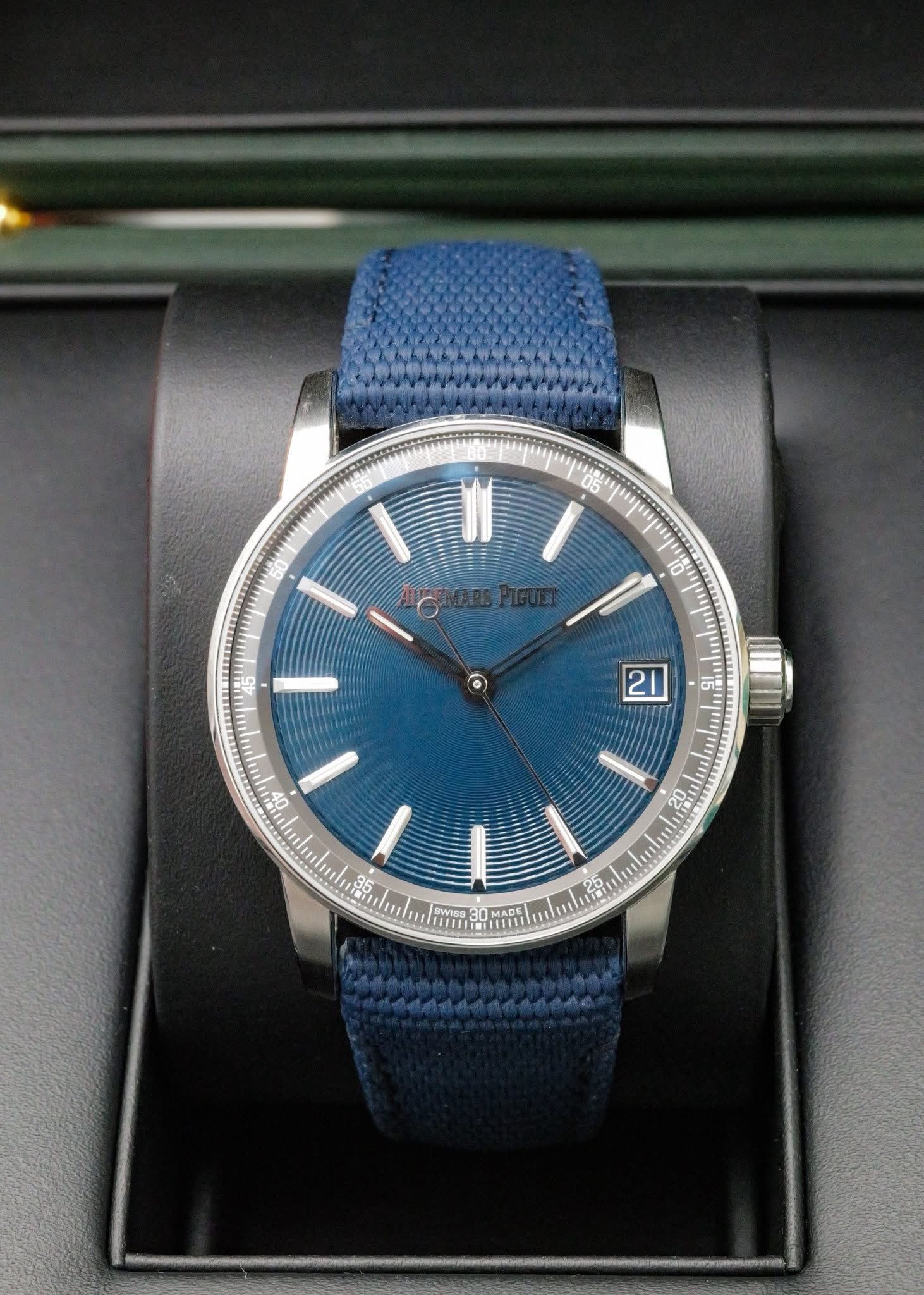 May be an image of wrist watch and text