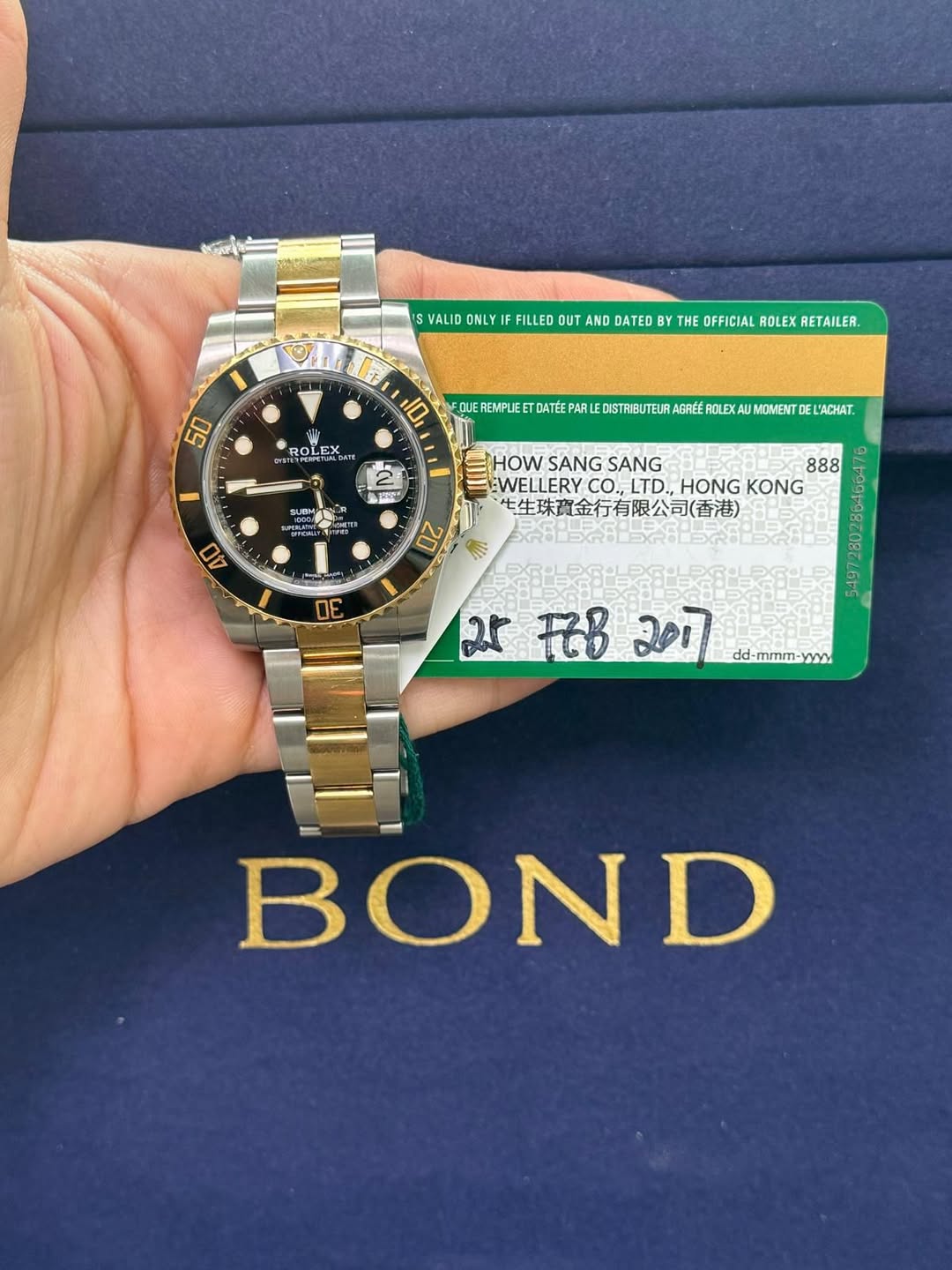 May be an image of wrist watch and text that says 'IS SVALID ONLY F FILLED OUT AND DATED BY THE OFFICIA ROLEX RETAILER. 50 oo OLEM 10 QUEREMPLIE DATEE そ0FPETH在EAIAAIAI ARL…