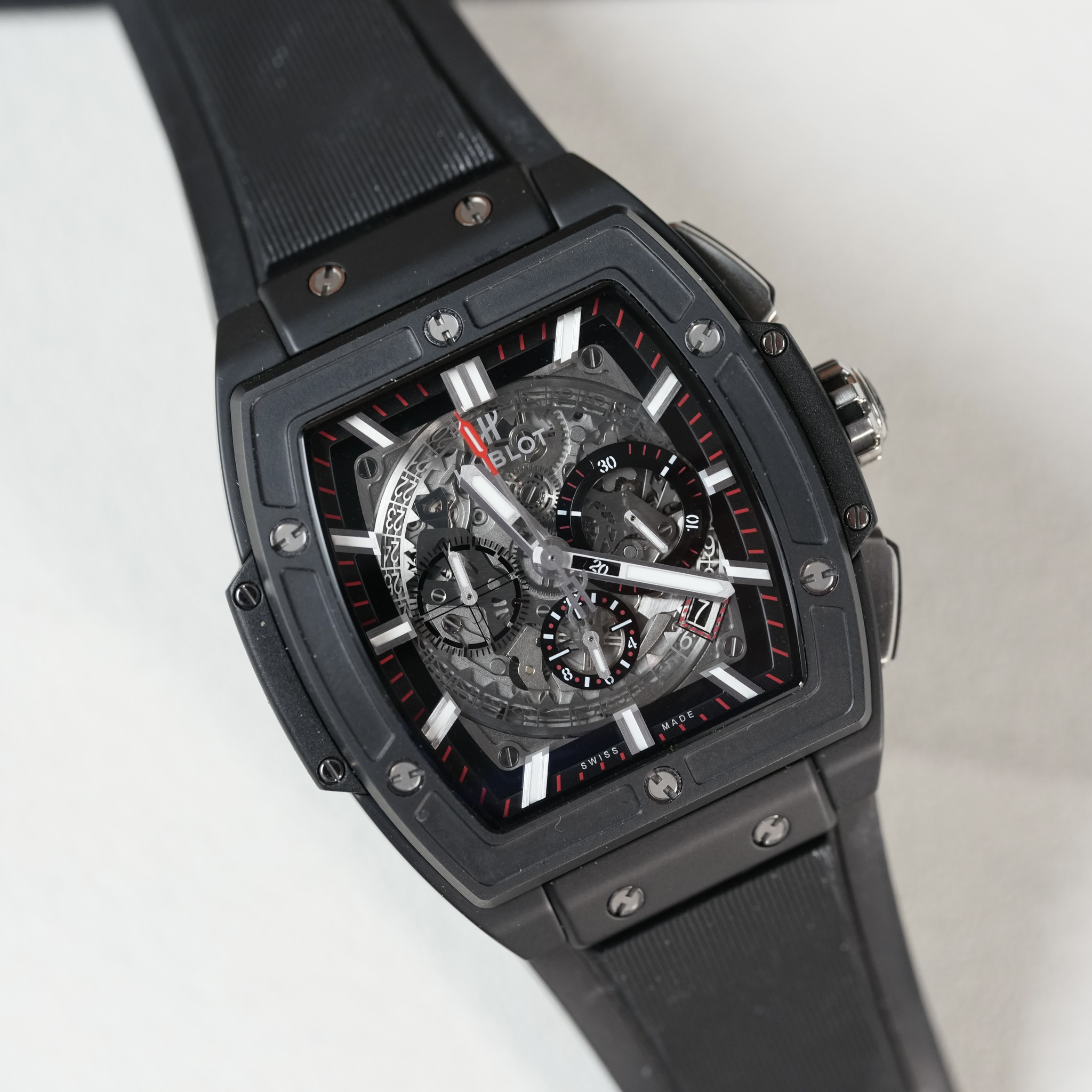 May be an image of wrist watch and text