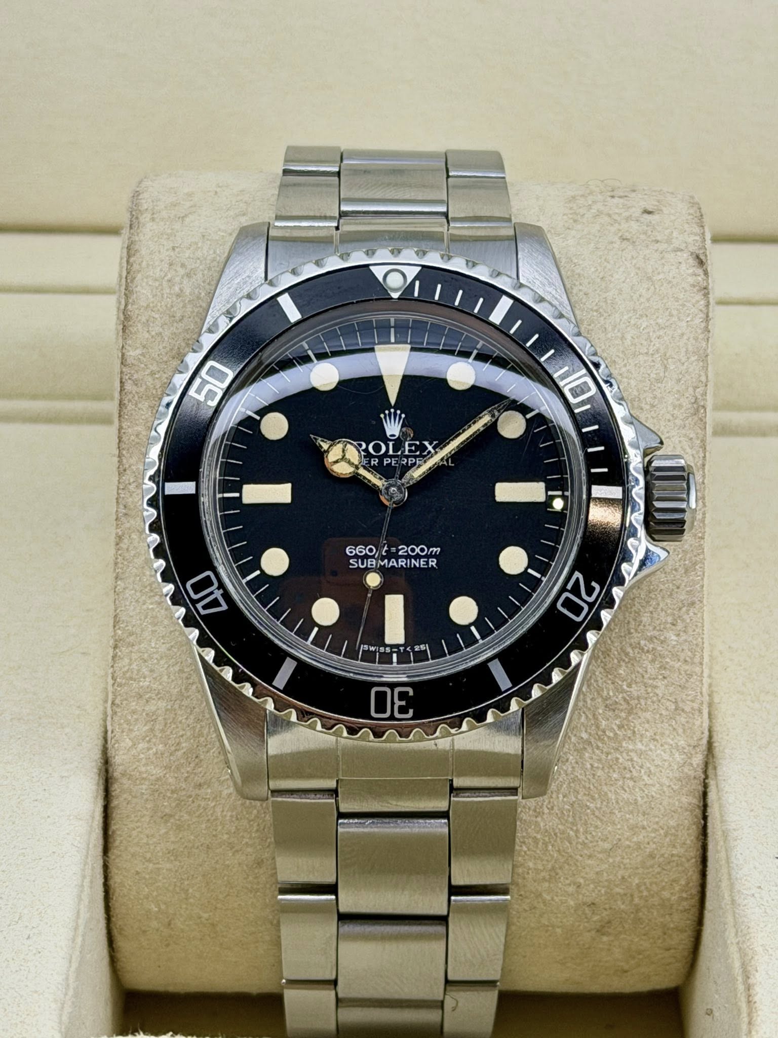 May be an image of wrist watch and text that says '50 L1O TRROLEX POLEX RP 660t 60t=200m 200m SUBMARINER MAR NER SUB BMARIN 40 J5w 20 30'