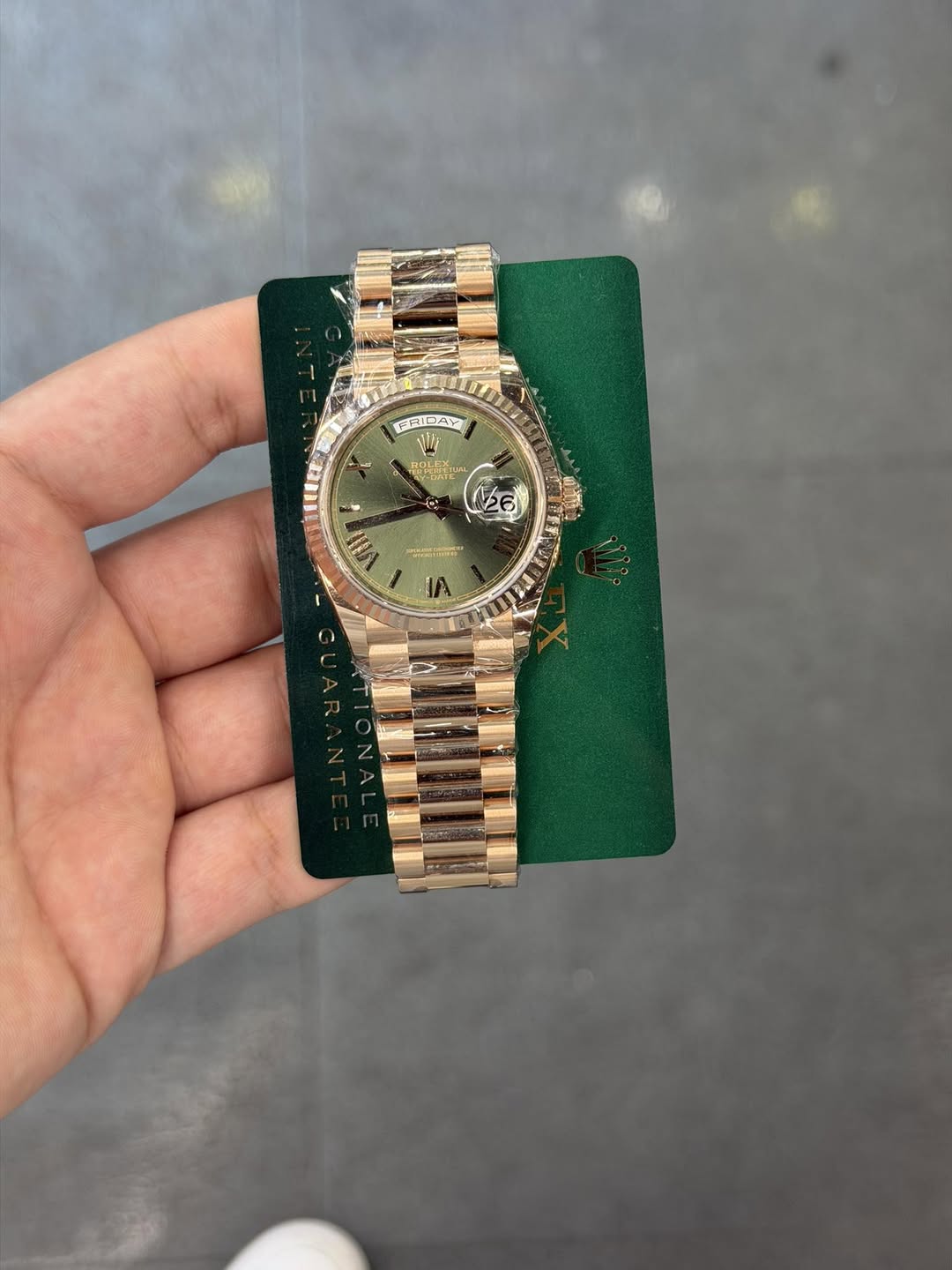 May be an image of wrist watch and text