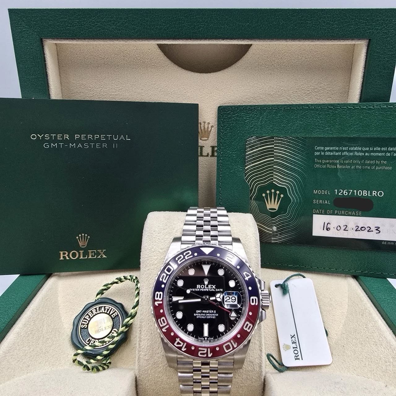 May be an image of wrist watch, timer and text