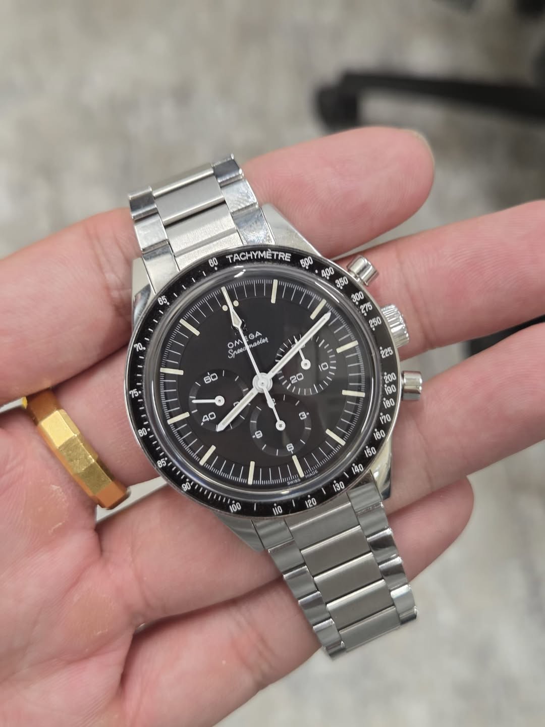 May be an image of wrist watch and text that says '80 TACHYMETRE ਨੇ OM GA aoder 60 お aO S0 00 1g0 to0 0U e ទុំ ل ஸ்யமுமக 00 120 중-'