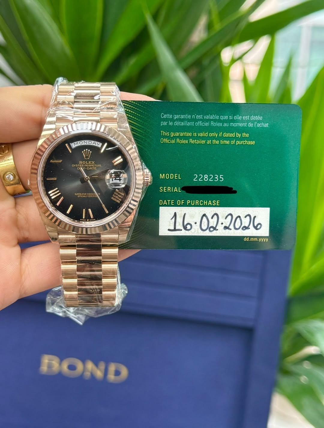 May be an image of wrist watch and text