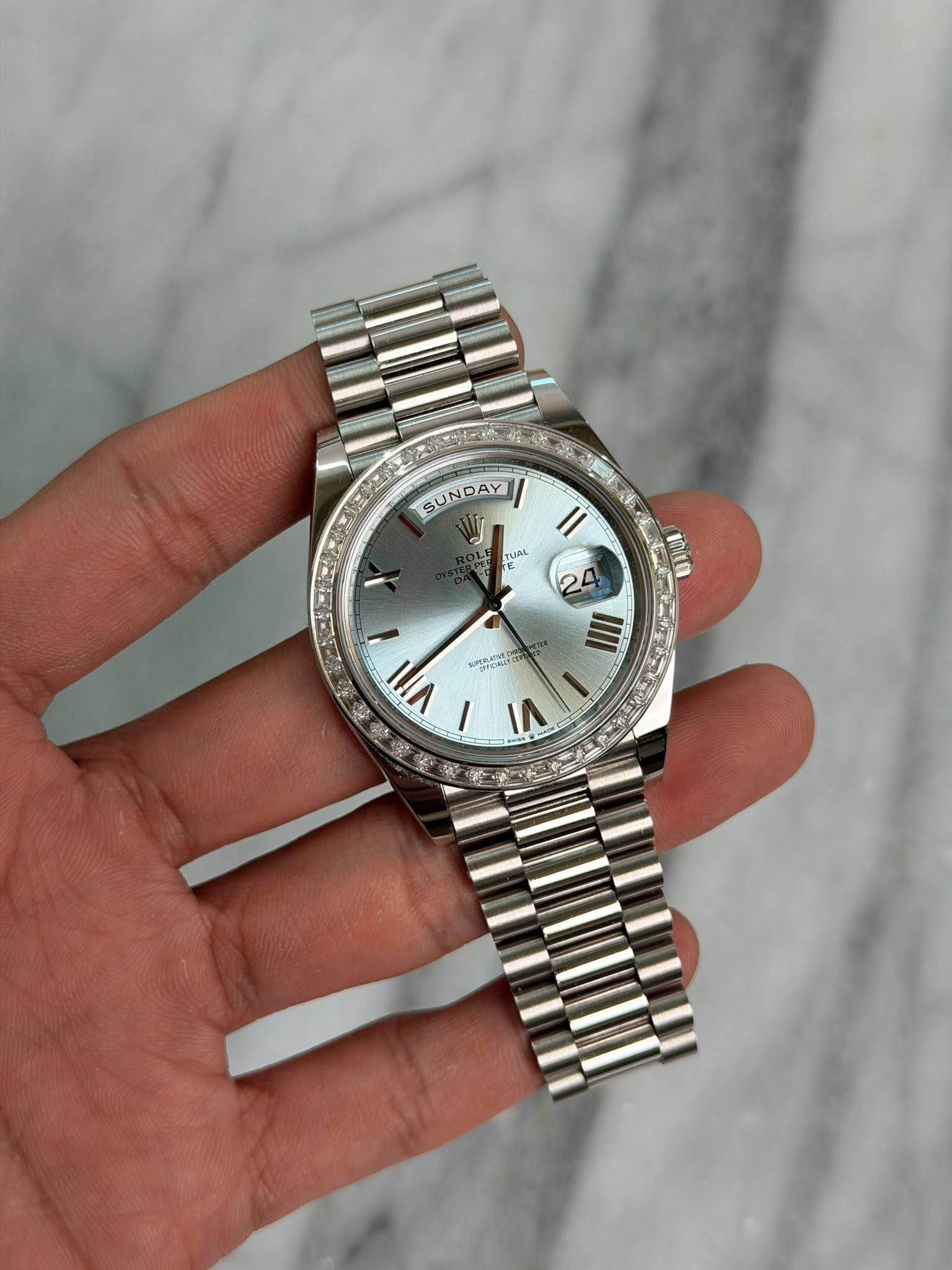 May be an image of wrist watch and text