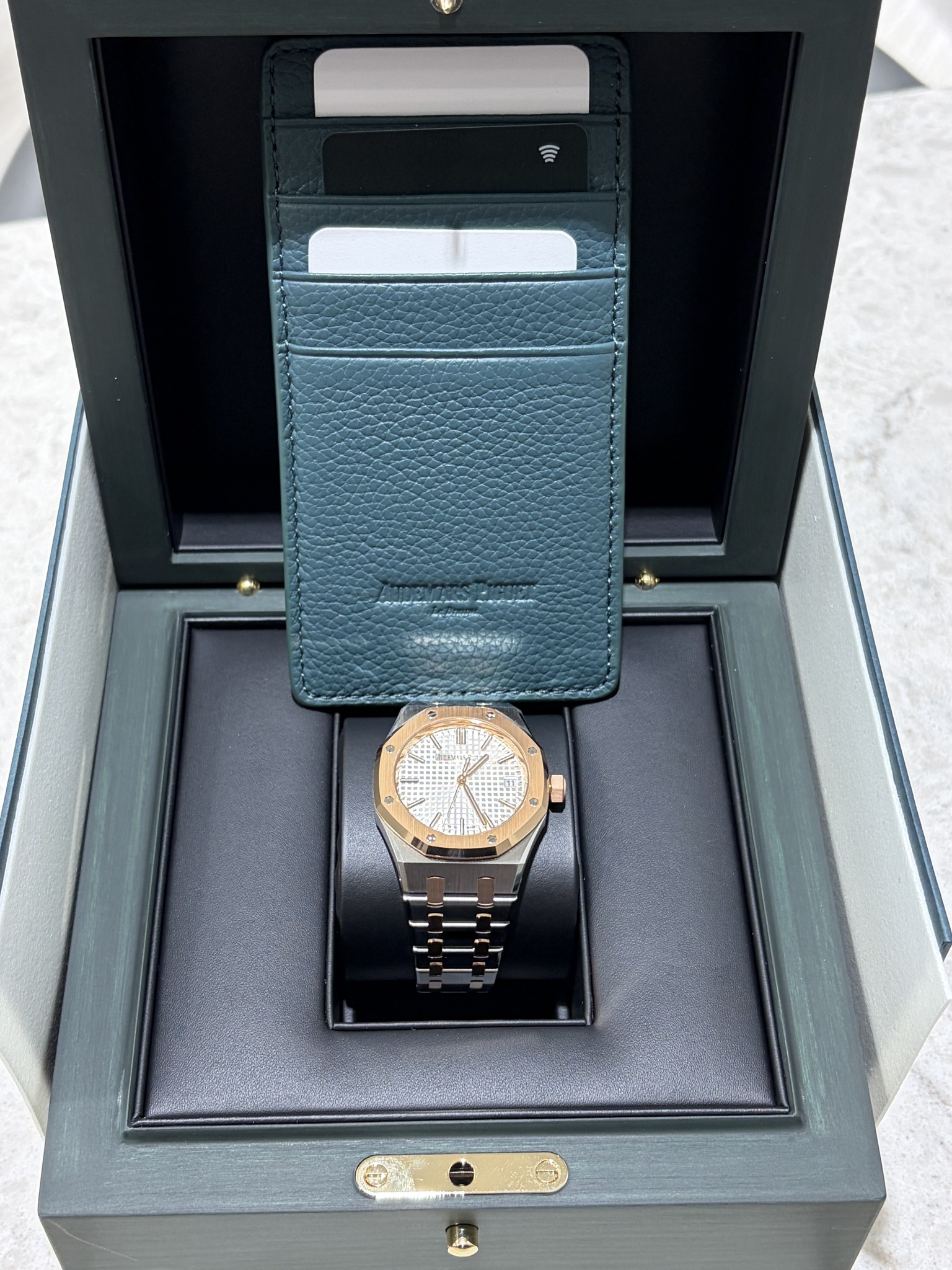 May be an image of wrist watch and text