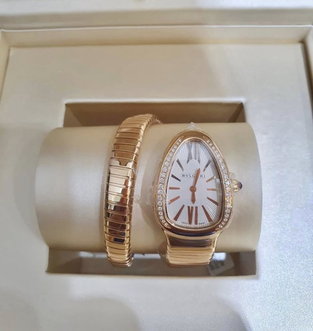 May be an image of wrist watch, jewelry and text