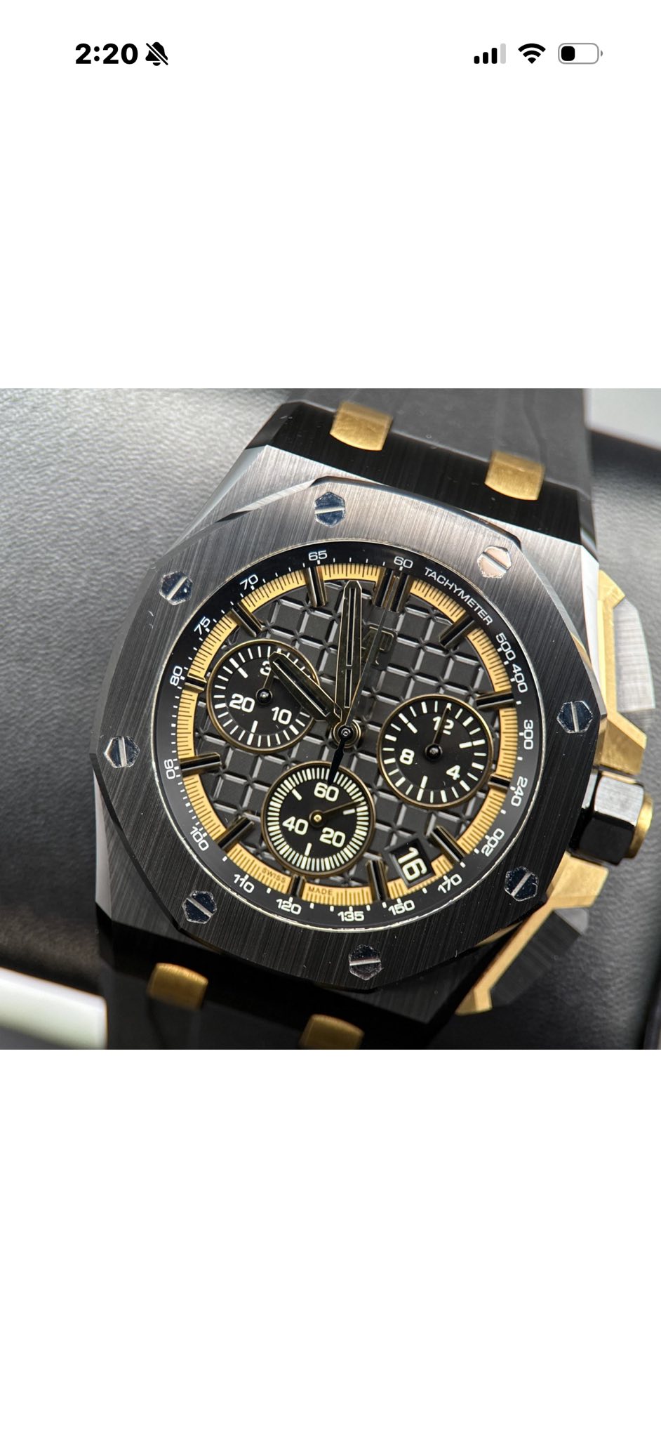 May be an image of wrist watch and text