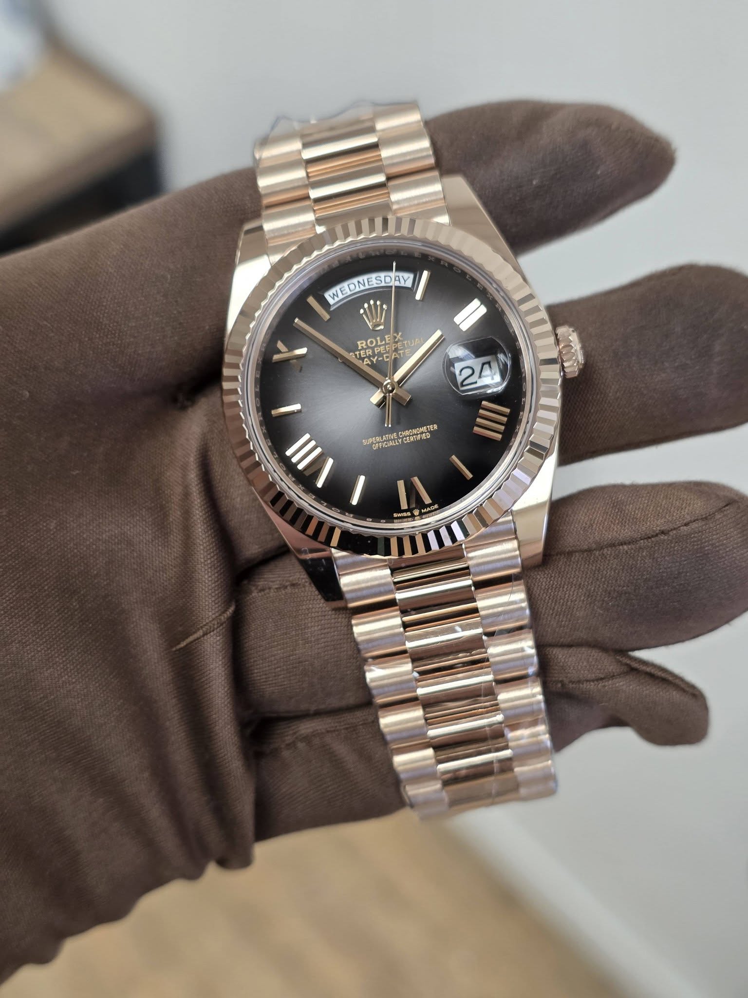 May be an image of wrist watch and text