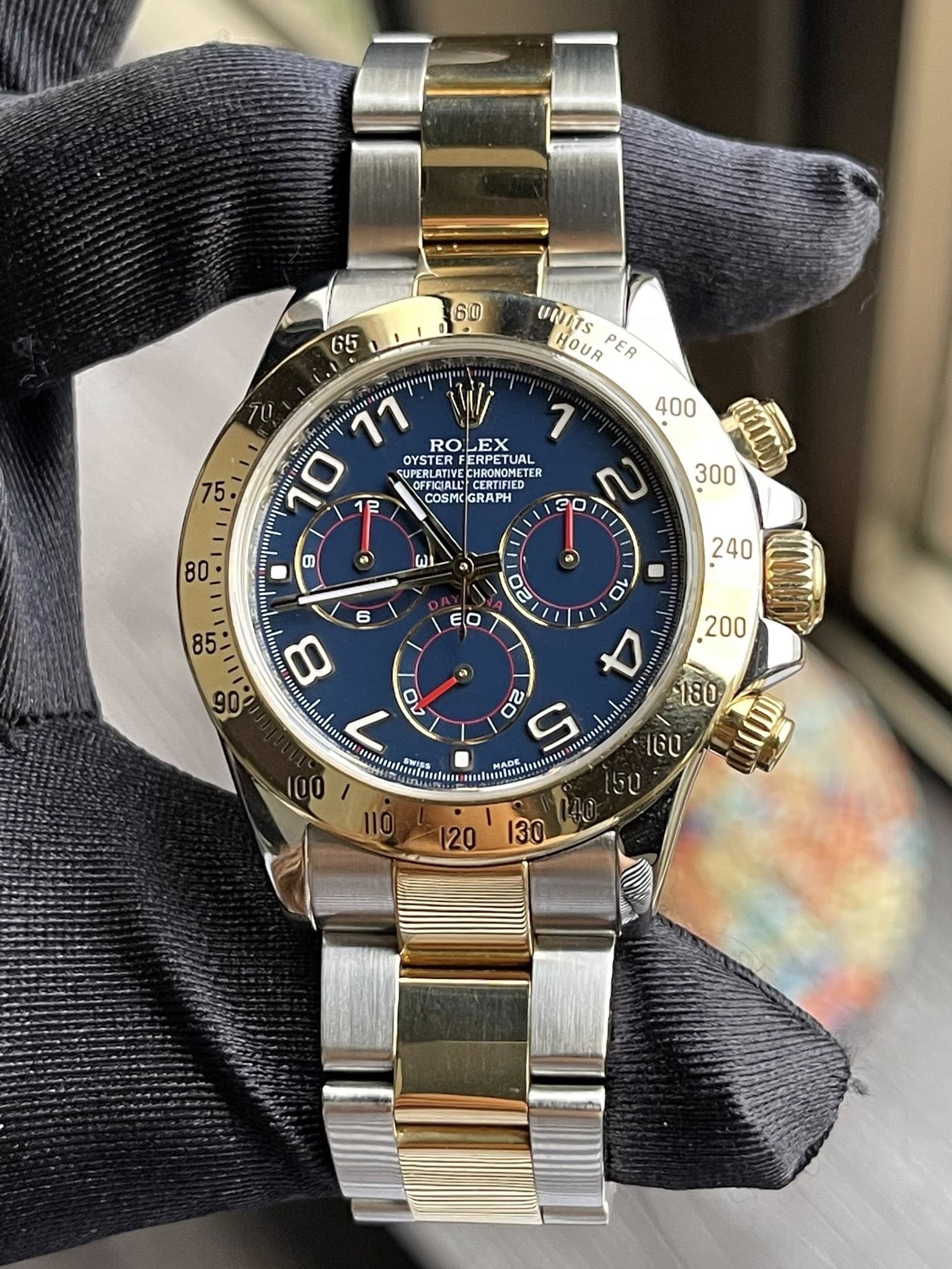 May be an image of wrist watch and text