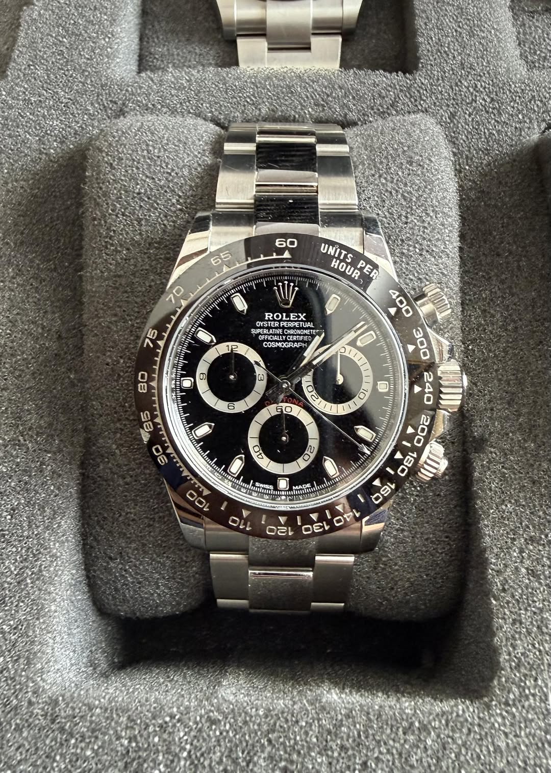 May be an image of wrist watch and text