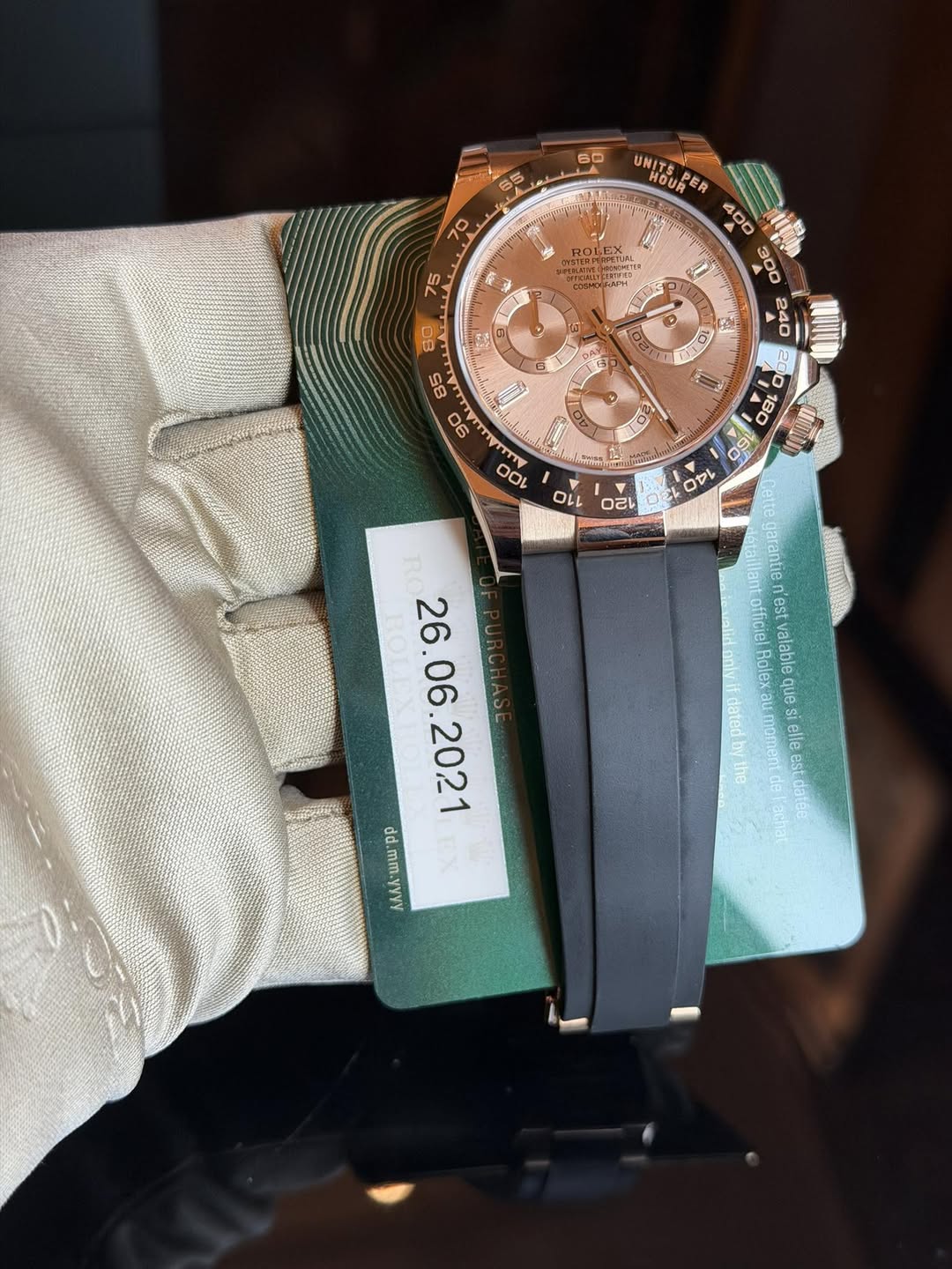 May be an image of wrist watch and text