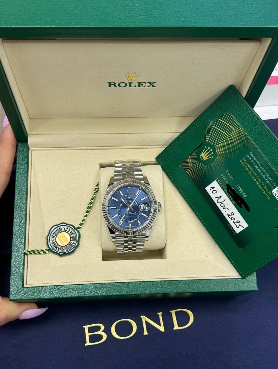 May be an image of wrist watch and text