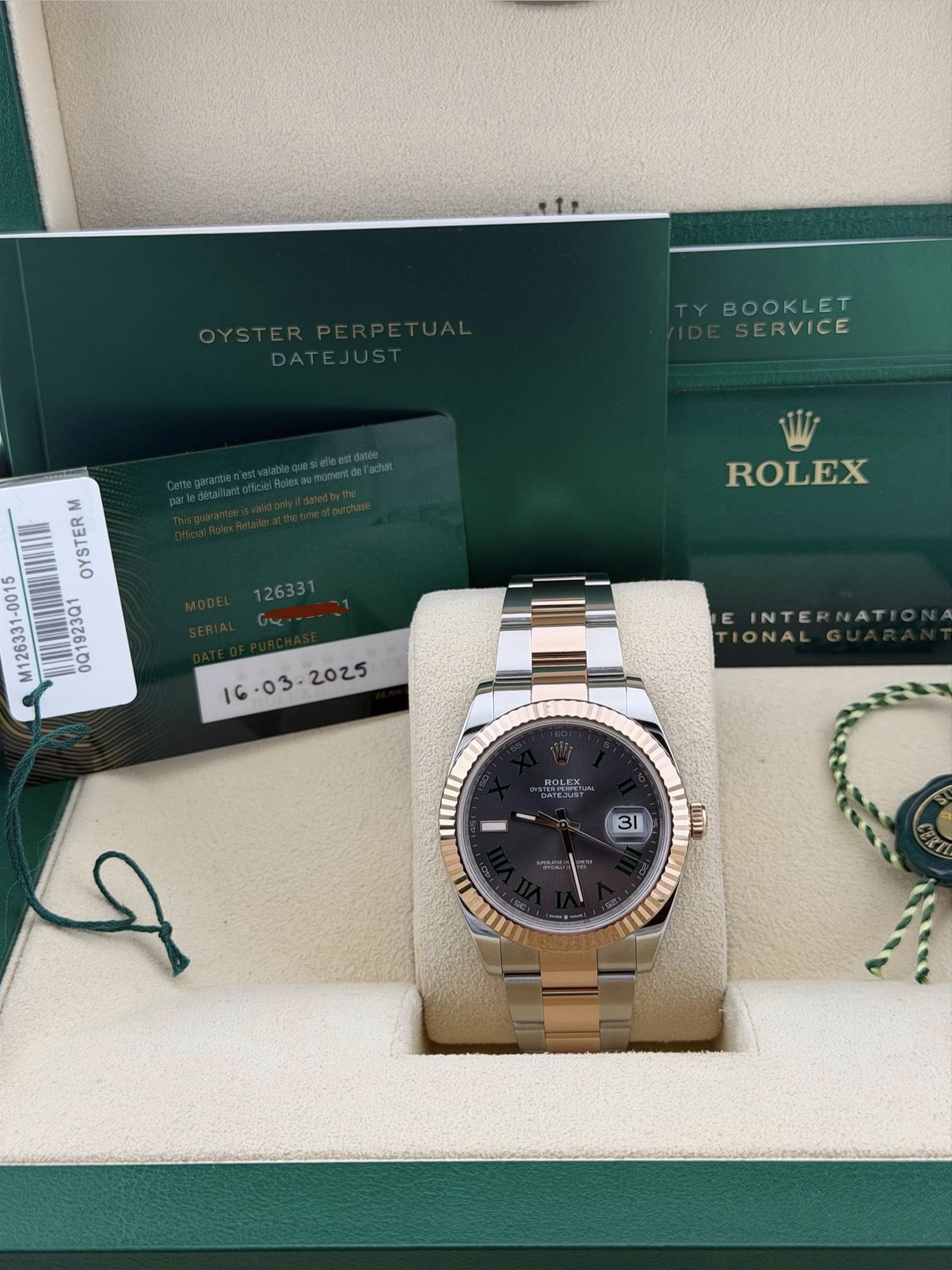 May be an image of wrist watch and text