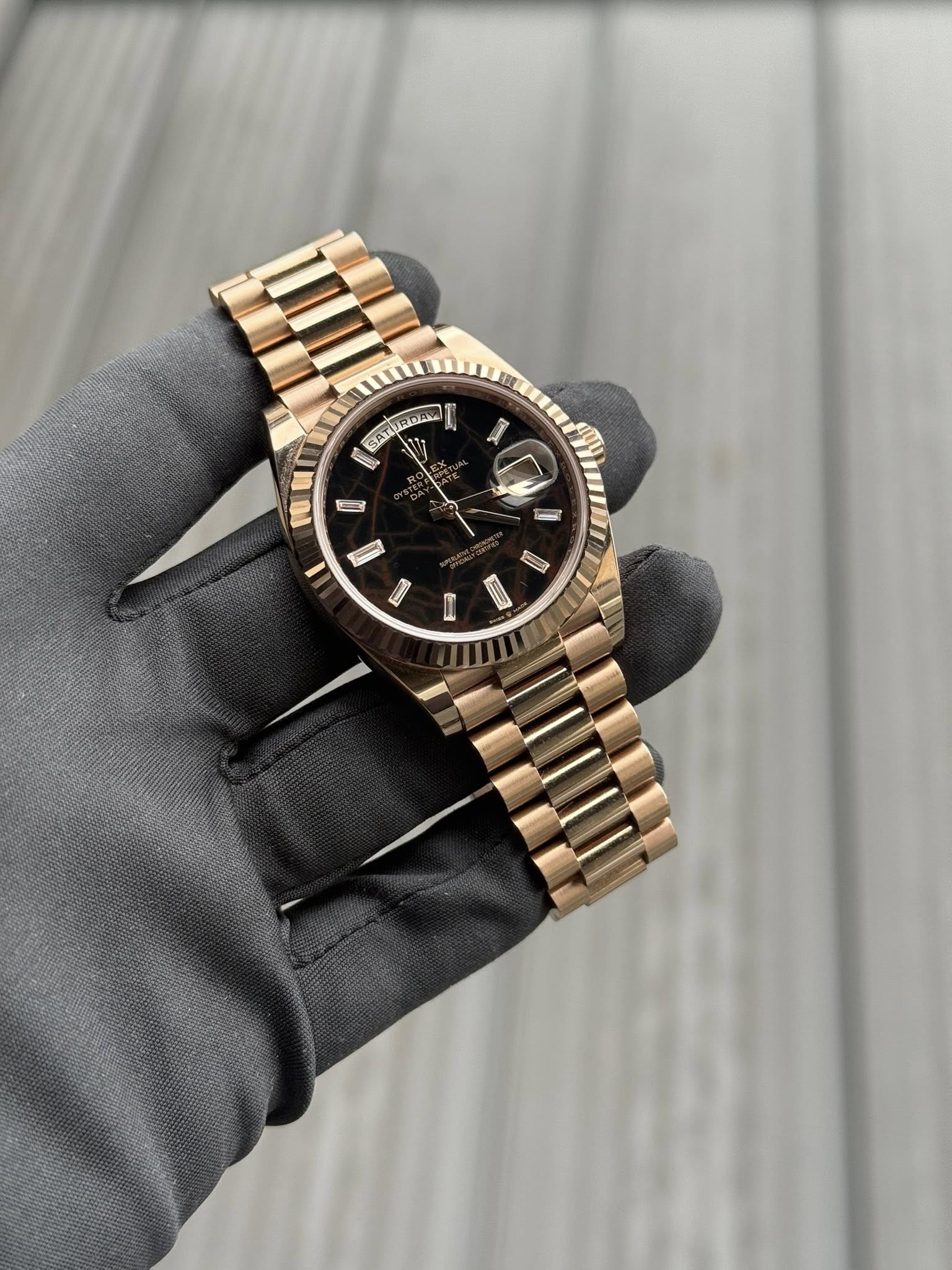 May be an image of wrist watch and text