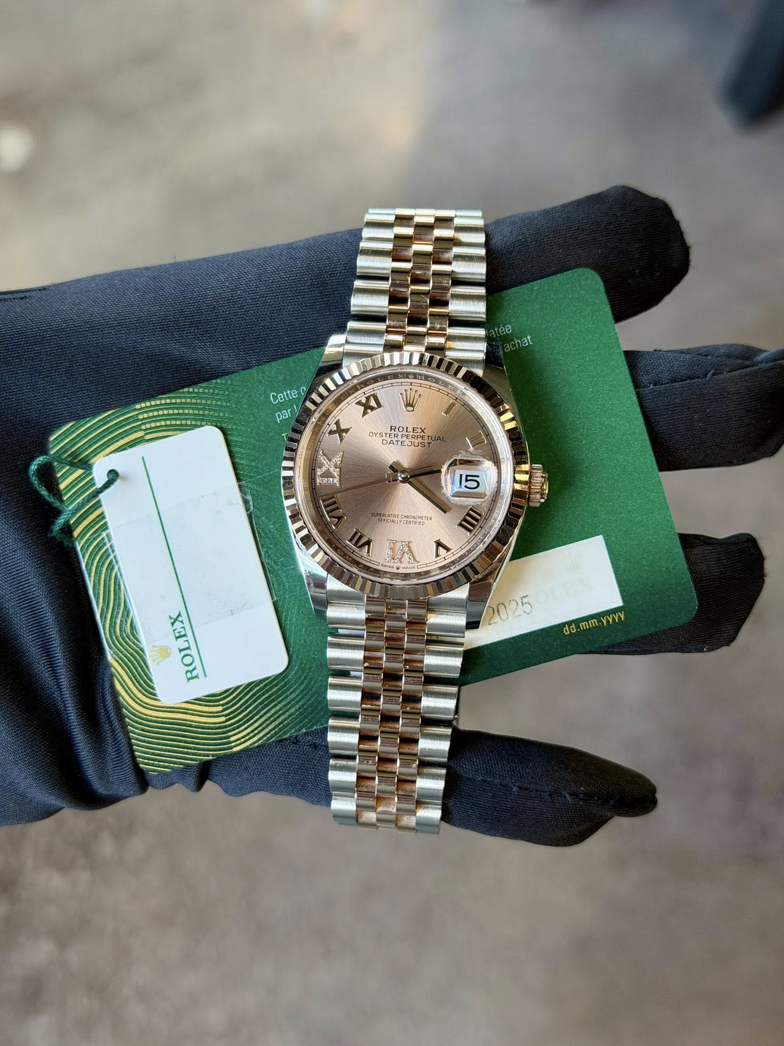 May be an image of wrist watch and text