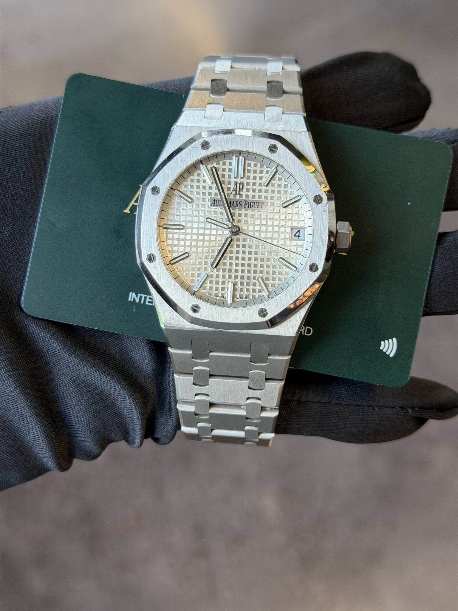May be an image of wrist watch and text
