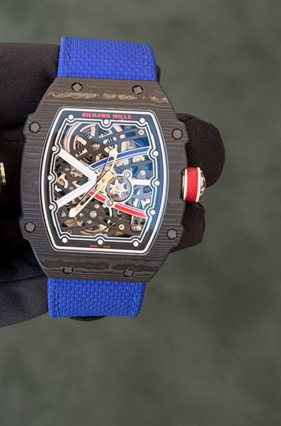 May be an image of wrist watch and text