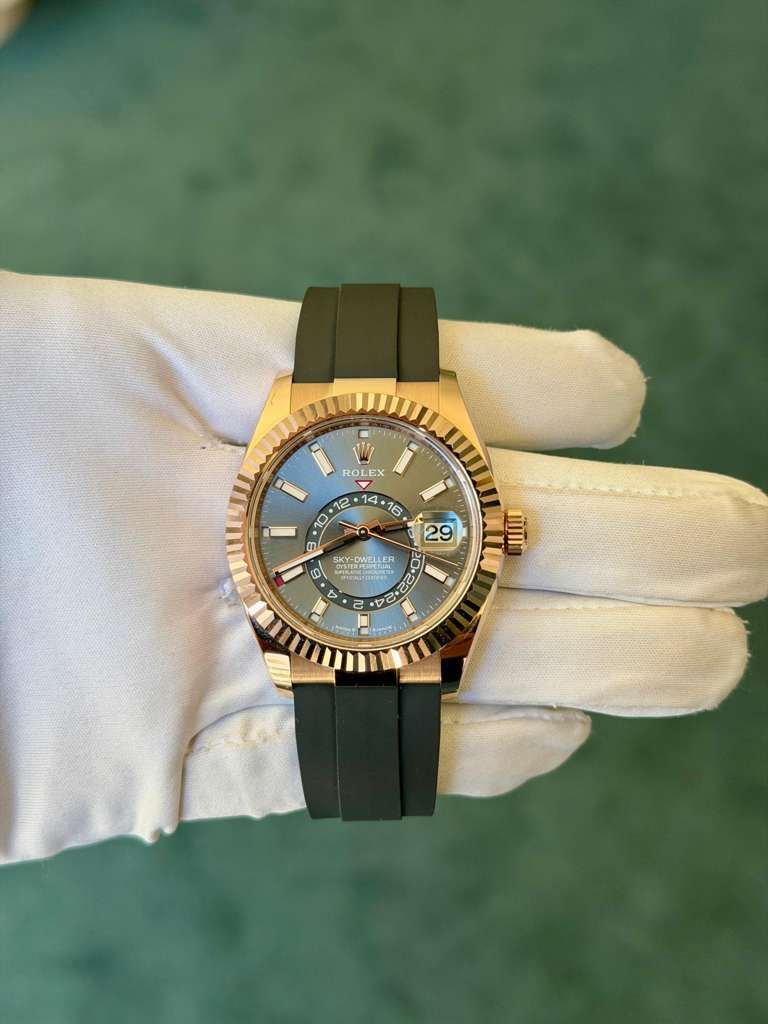May be an image of wrist watch and text