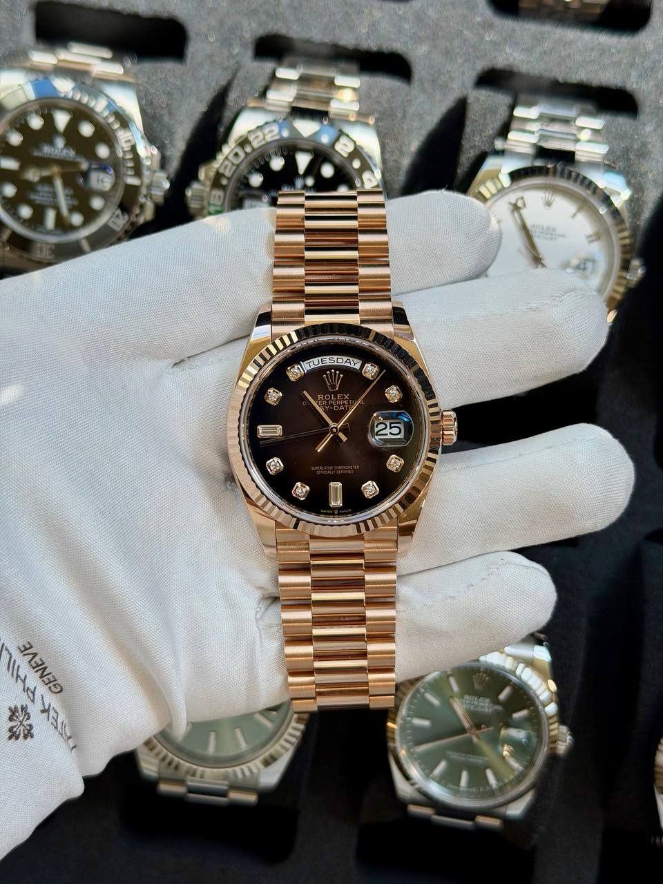 May be an image of wrist watch and text