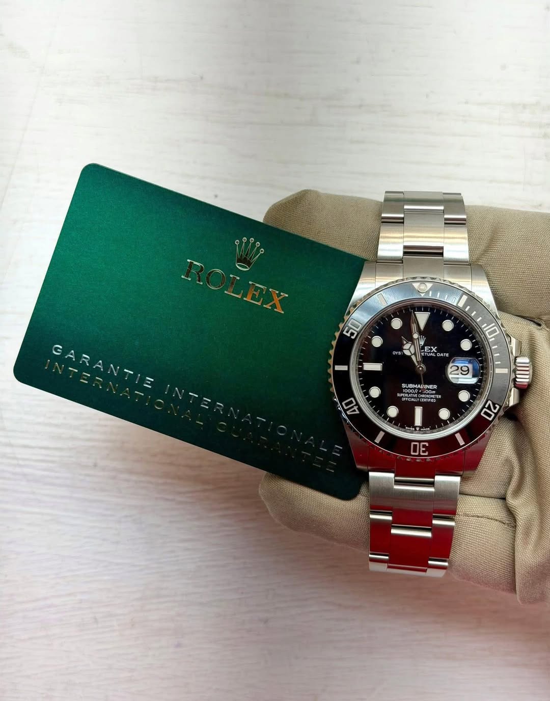 May be an image of wrist watch and text