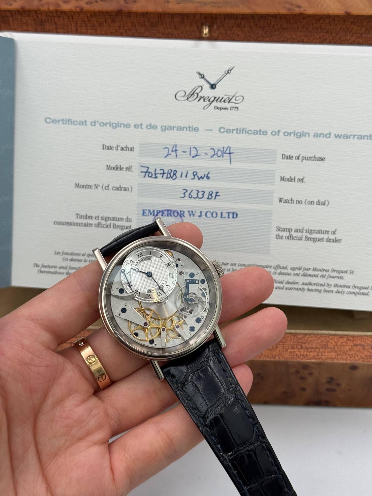 May be an image of wrist watch and text that says 'Certificat d'origine et de garantie Aregueto 1773 Depets Date Dated'achat 'achat Montre Certificate of origin and warrant Modele…
