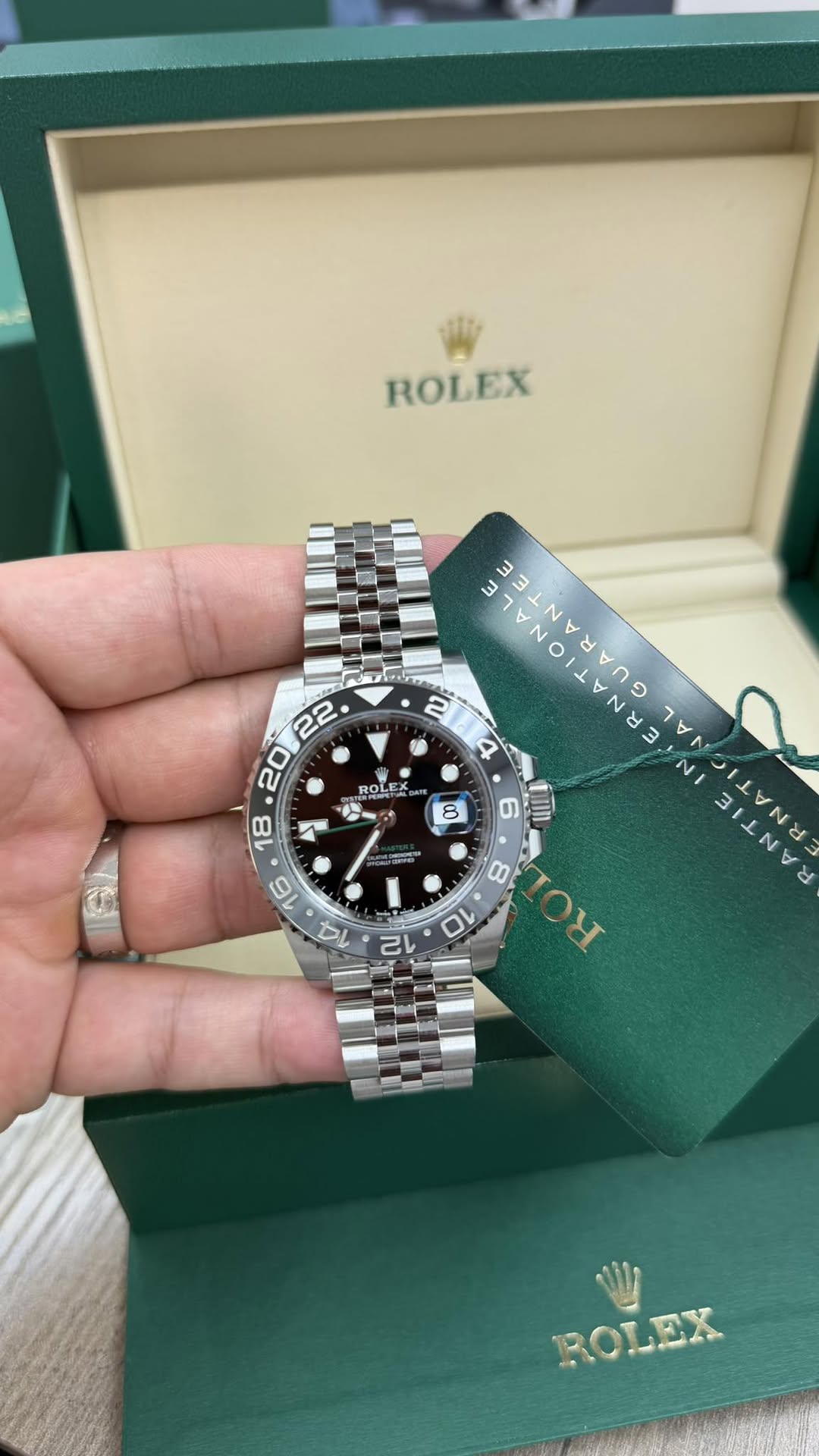 May be an image of wrist watch and text