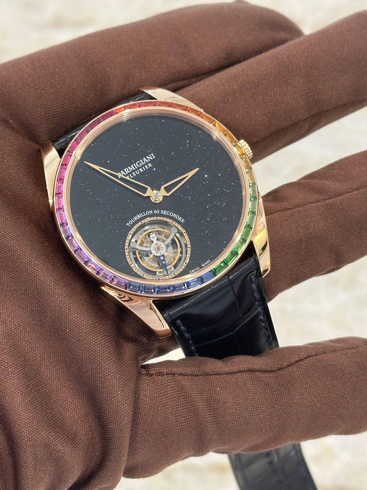 May be an image of digital watch and text that says 'ARMIGIANI KIE EL URI LEURIER TOURBILLON 60 SECONDES த്് MAФC seress 4'