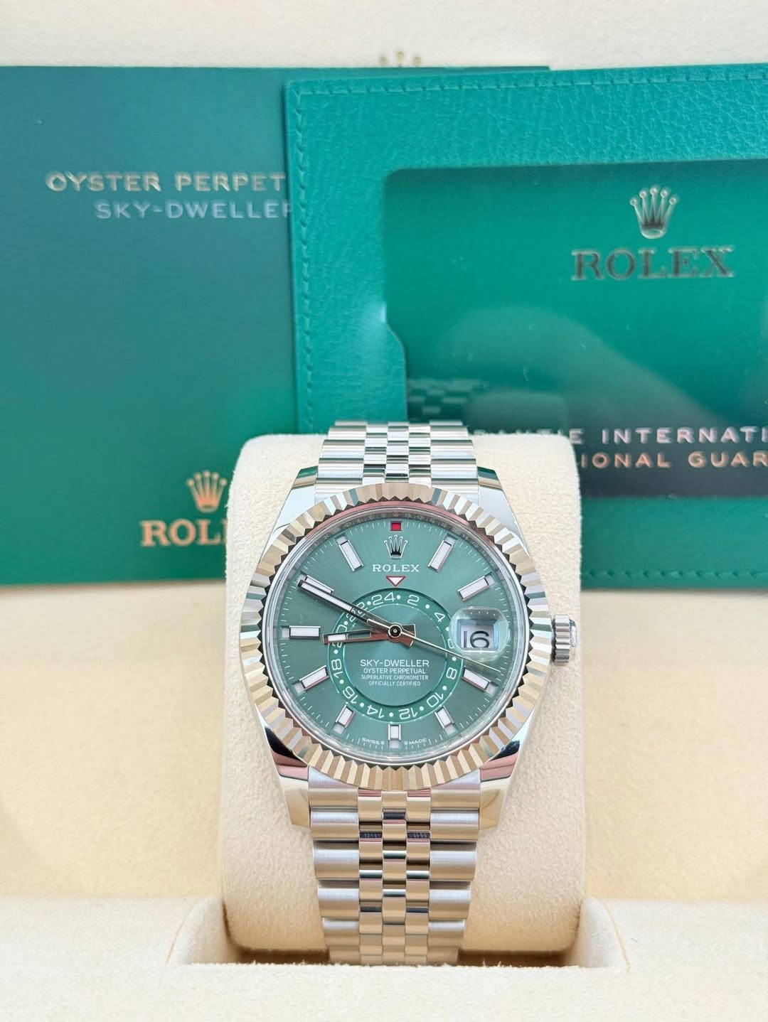 May be an image of wrist watch and text