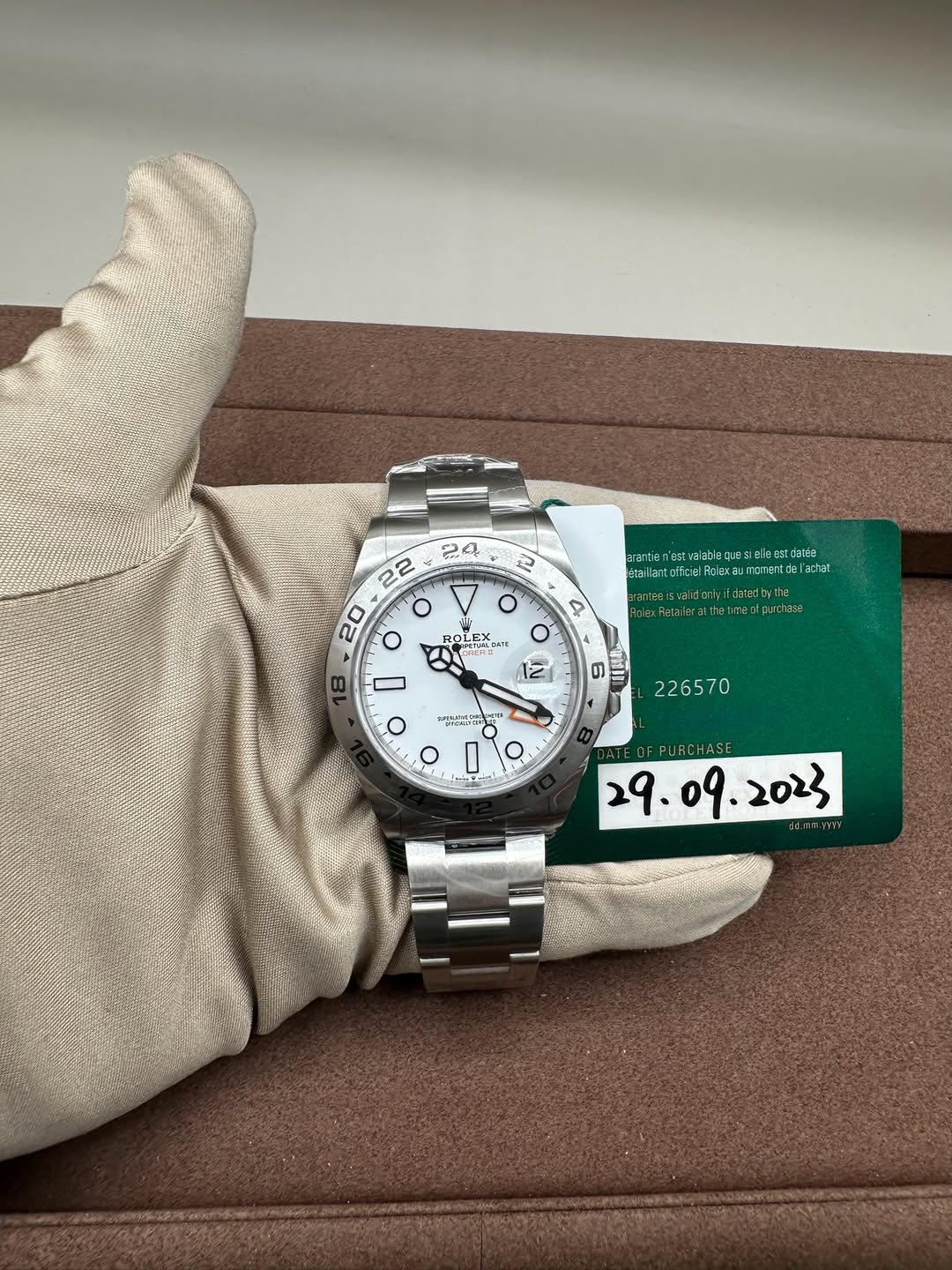 May be an image of wrist watch and text