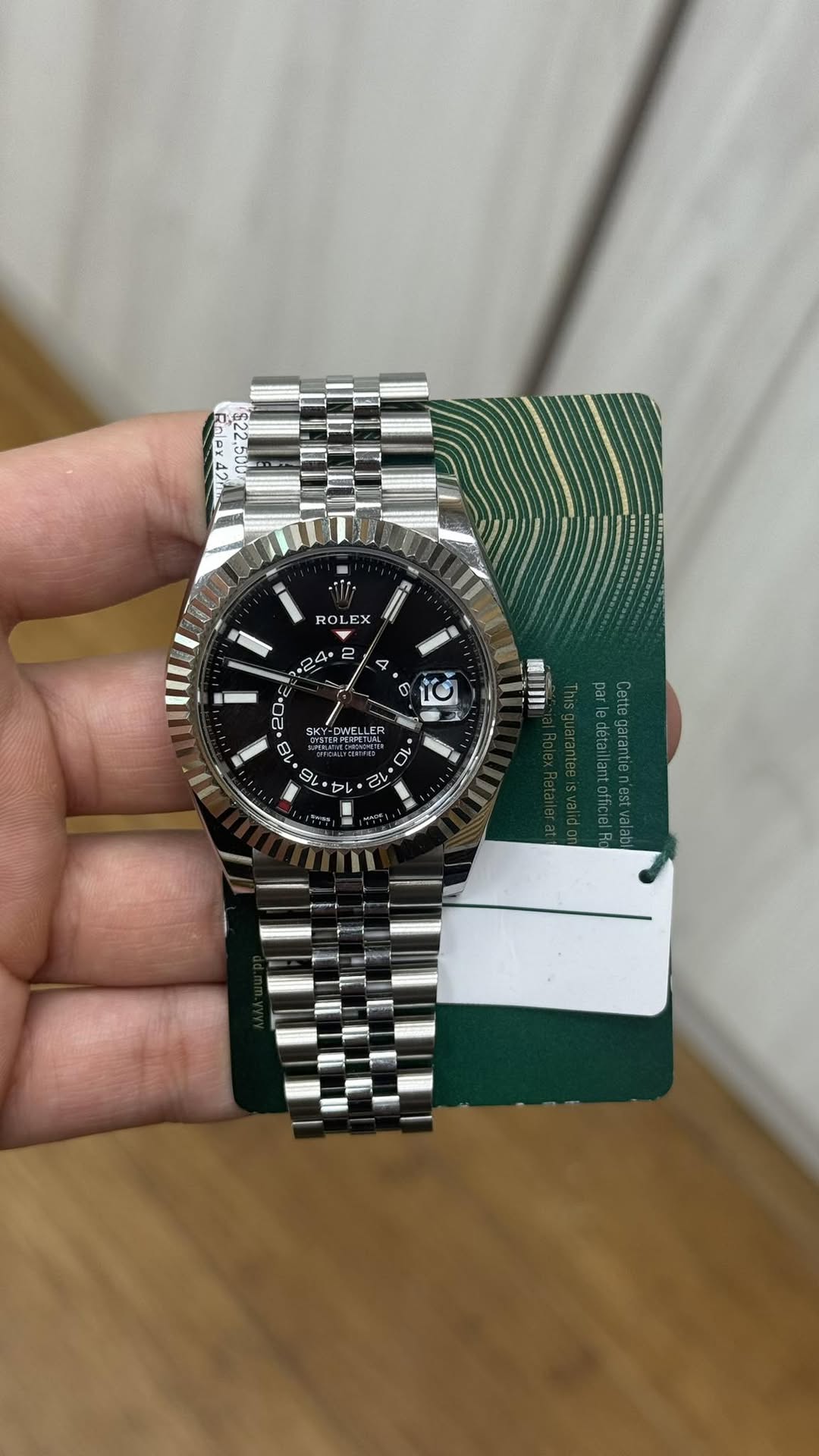 May be an image of wrist watch and text