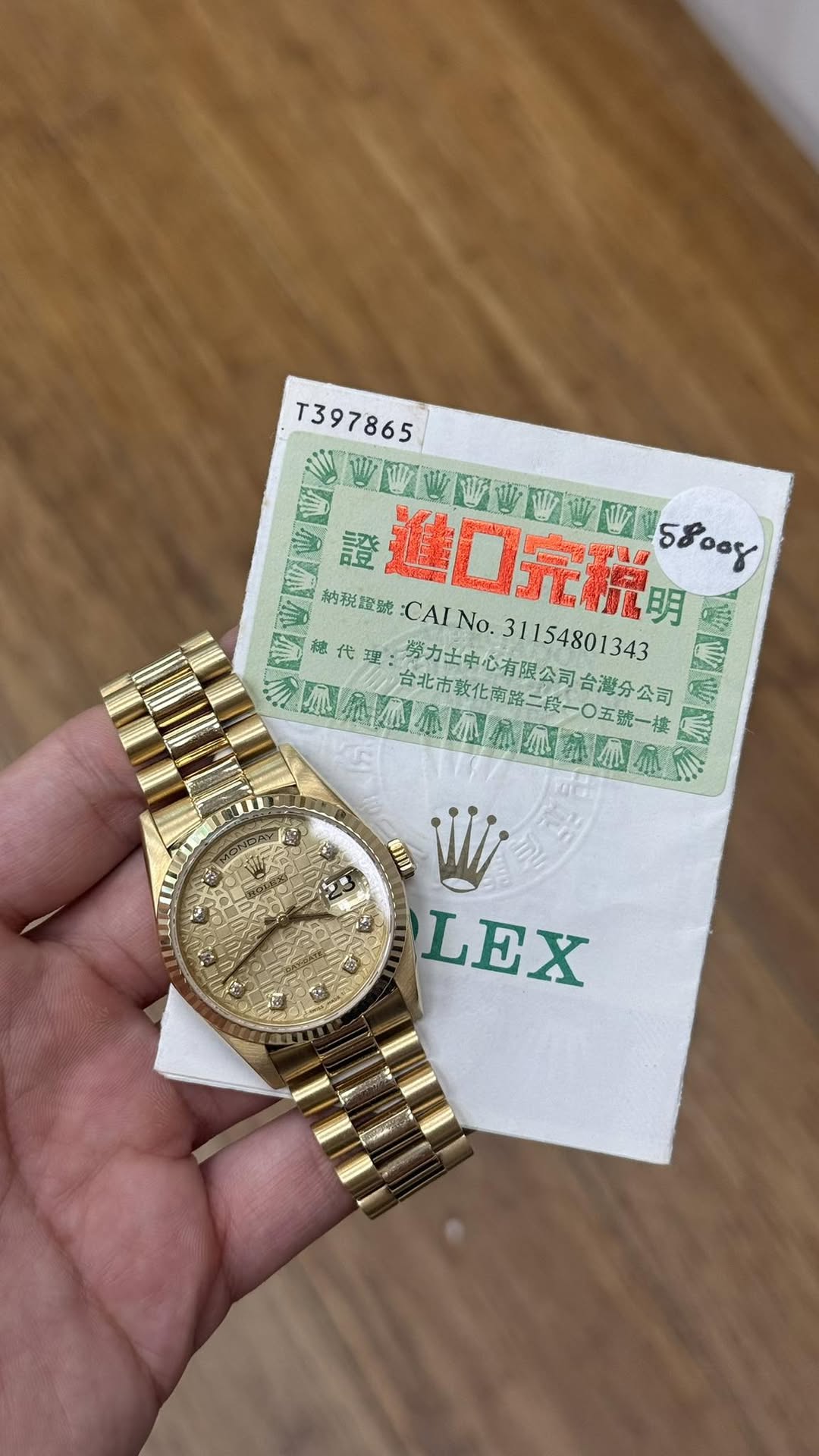 May be an image of wrist watch and text