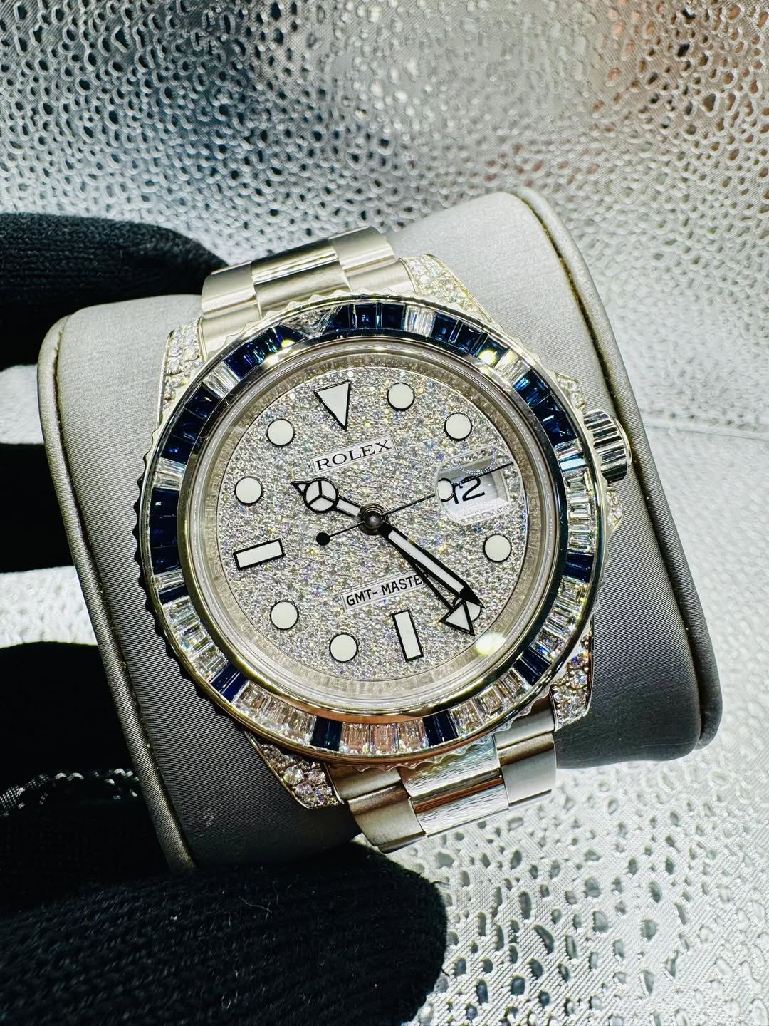 May be an image of wrist watch and text