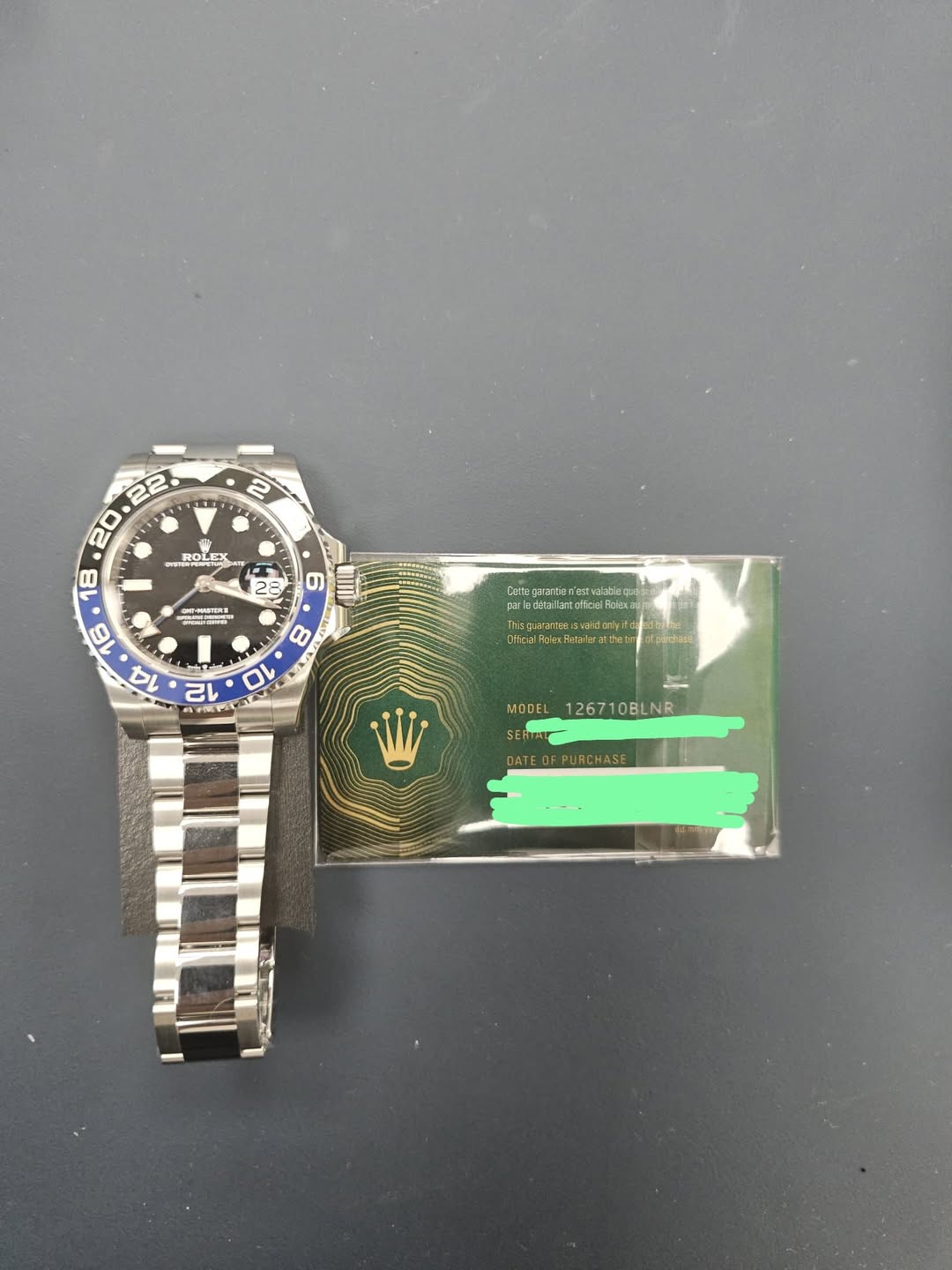 May be an image of ticket stub, wrist watch and text
