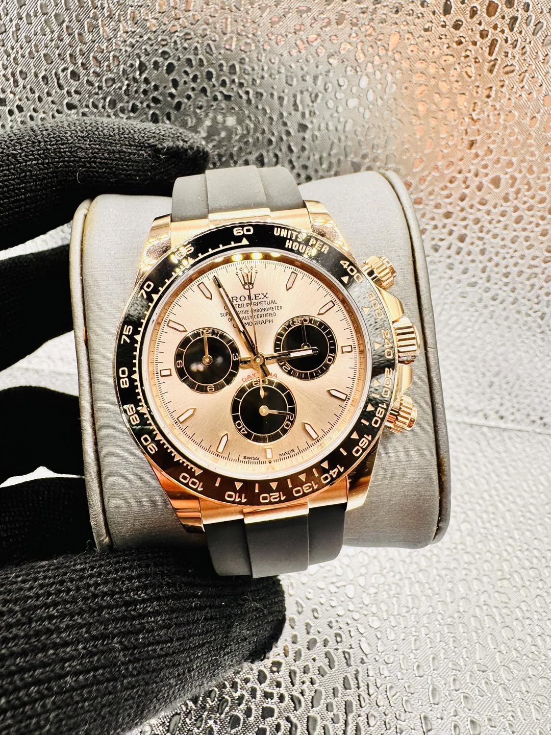 May be an image of wrist watch and text