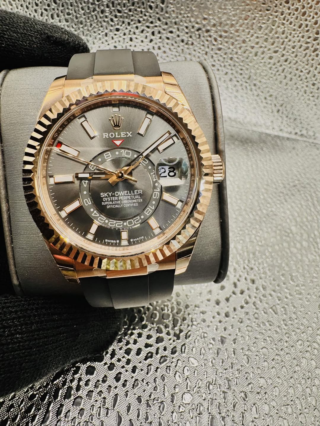 May be an image of wrist watch and text