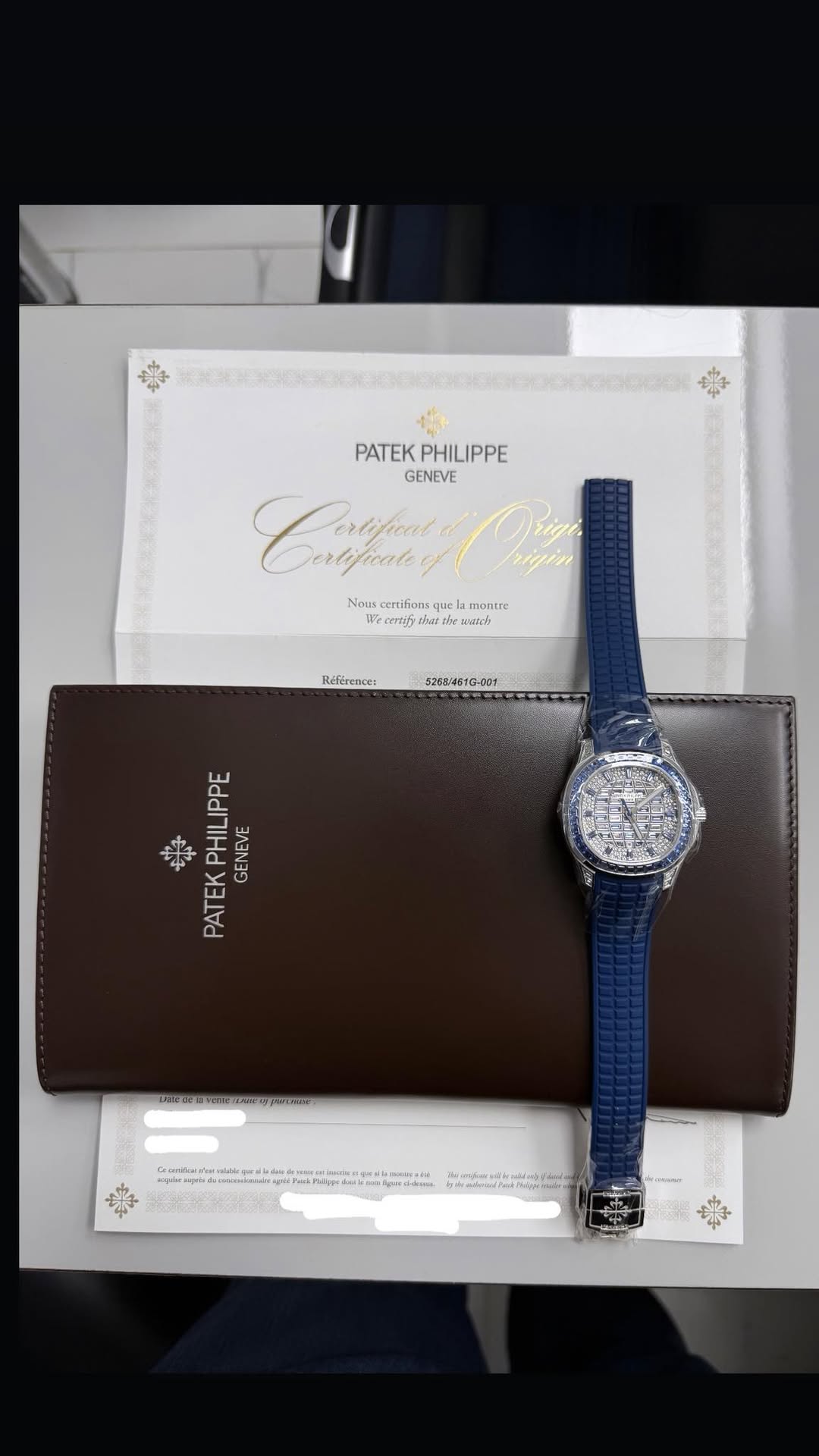 May be an image of wrist watch and text
