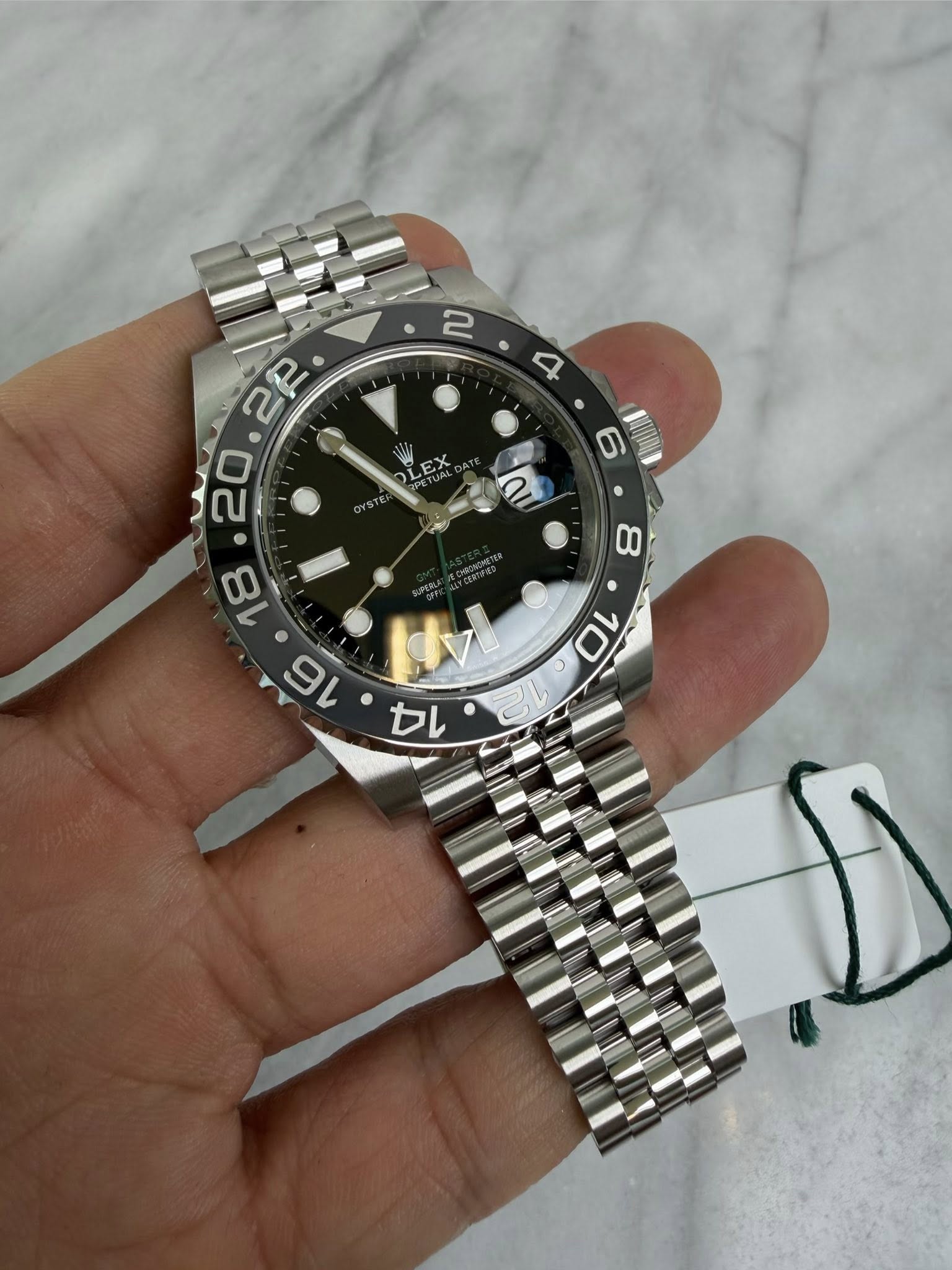 May be an image of wrist watch and text